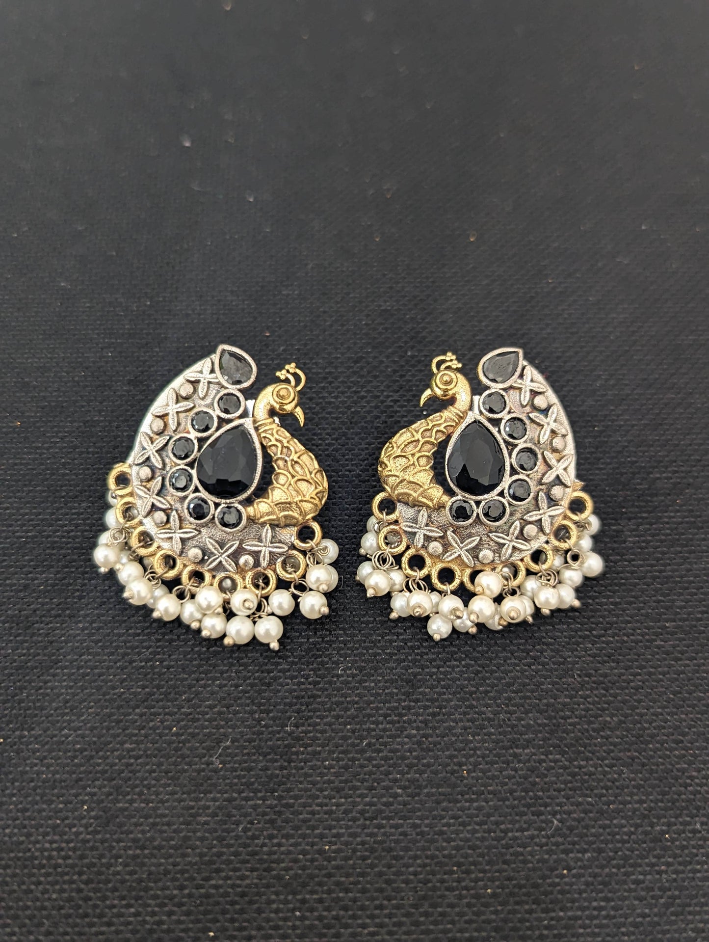 Peacock Dual tone german silver stud earrings