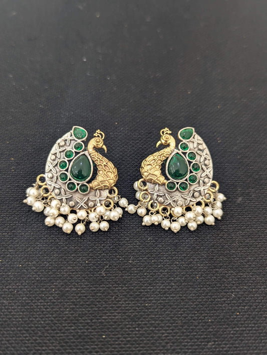 Peacock Dual tone german silver stud earrings