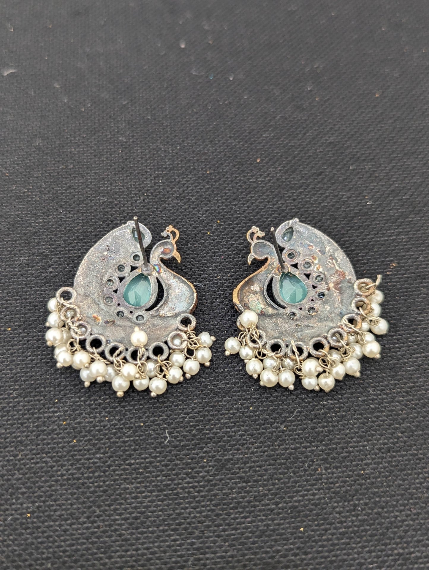 Peacock Dual tone german silver stud earrings