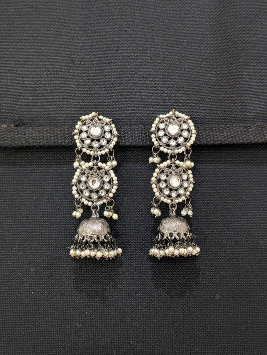 Black plated dual circle jhumka earrings
