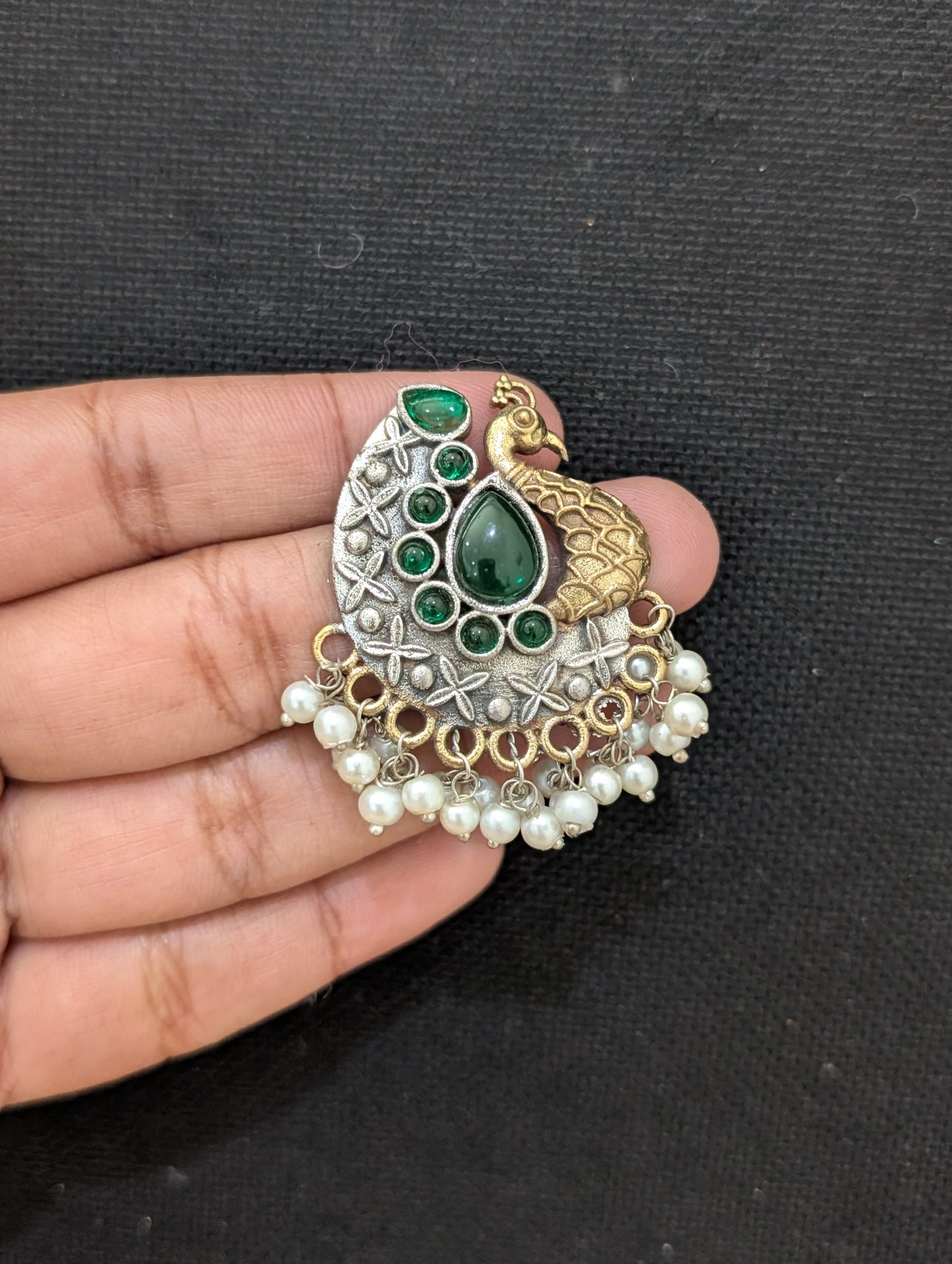 Peacock Dual tone german silver stud earrings