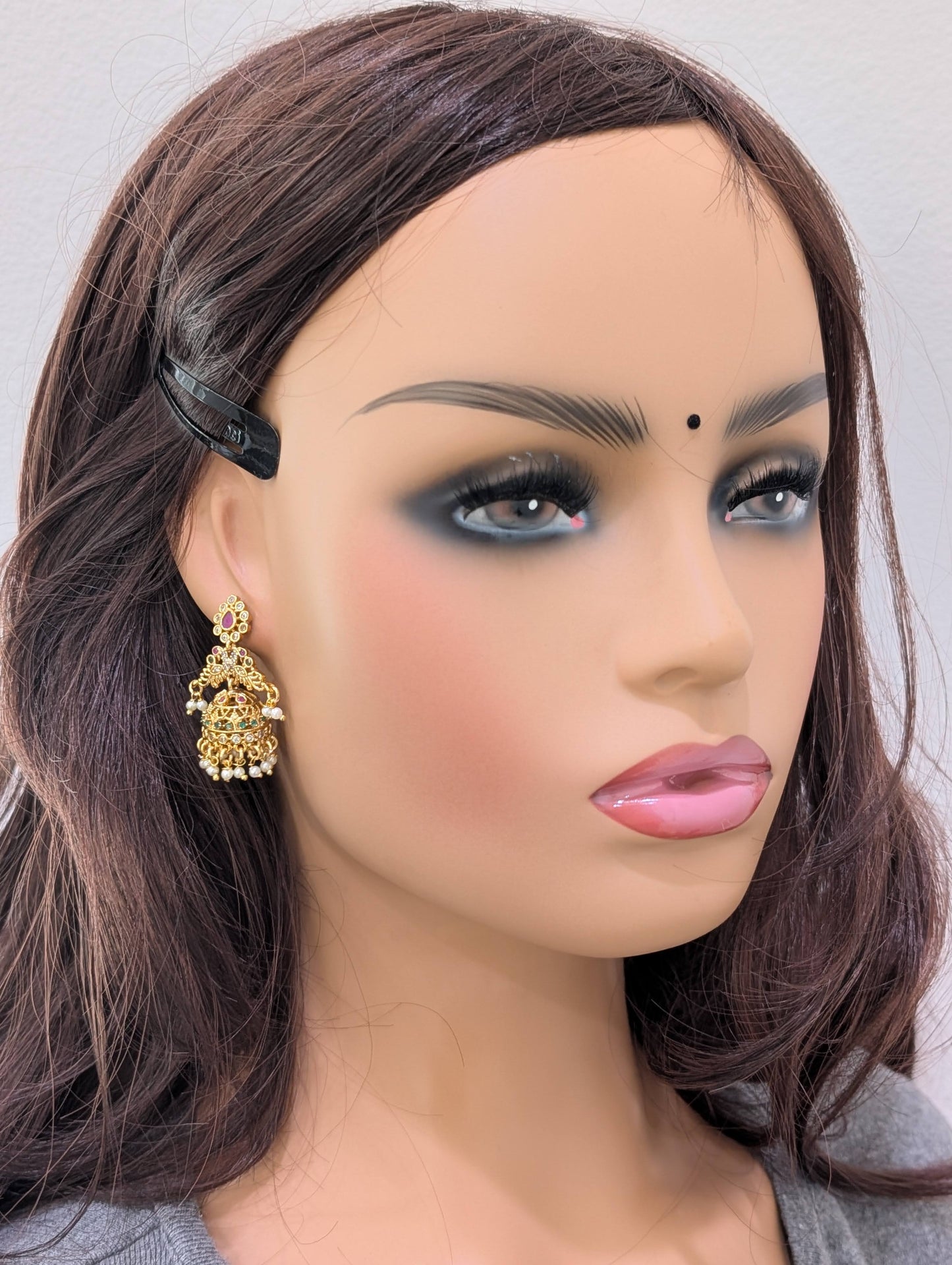 Shiny gold plated CZ Peacock Jhumka Earrings - Simpliful
