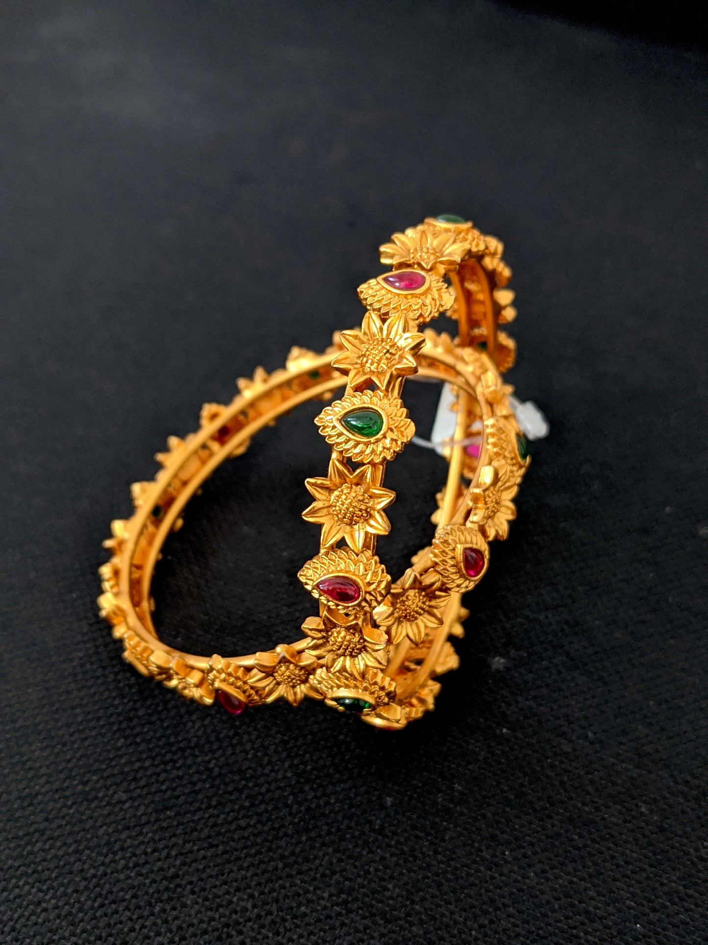 Alternate Flower n Teardrop design matte gold finish Kemp stone bangles