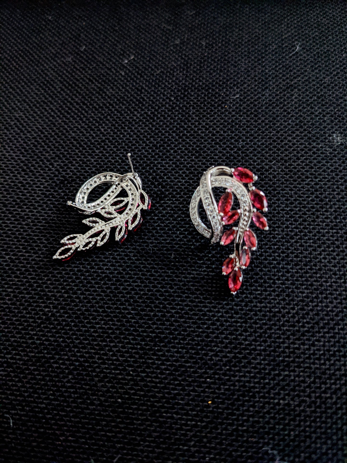 Curved leaf design luxury cz stone platinum finish party wear stud earring - Simpliful