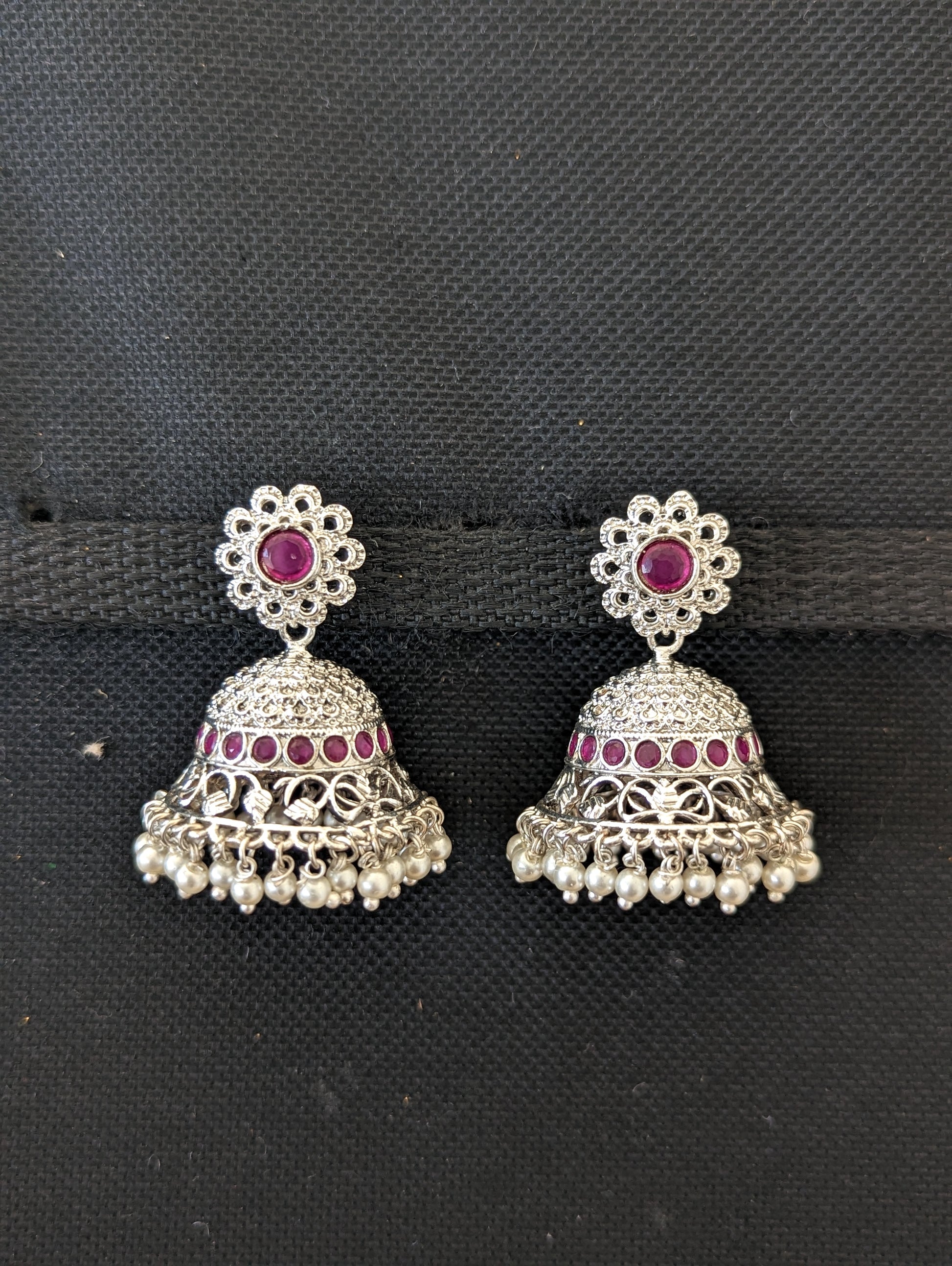 Bright silver rhodium CZ stone jhumka earrings - Simpliful