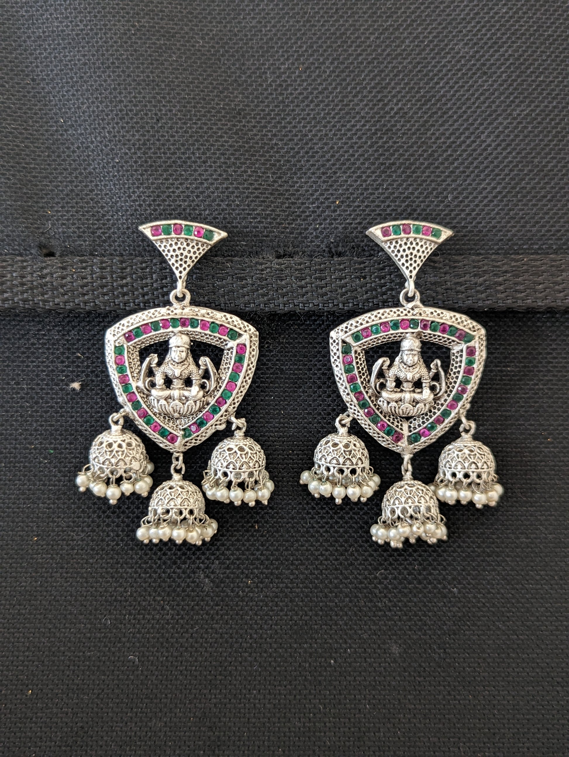 Goddess Lakshmi Triple jhumka bright matte silver earrings - Simpliful