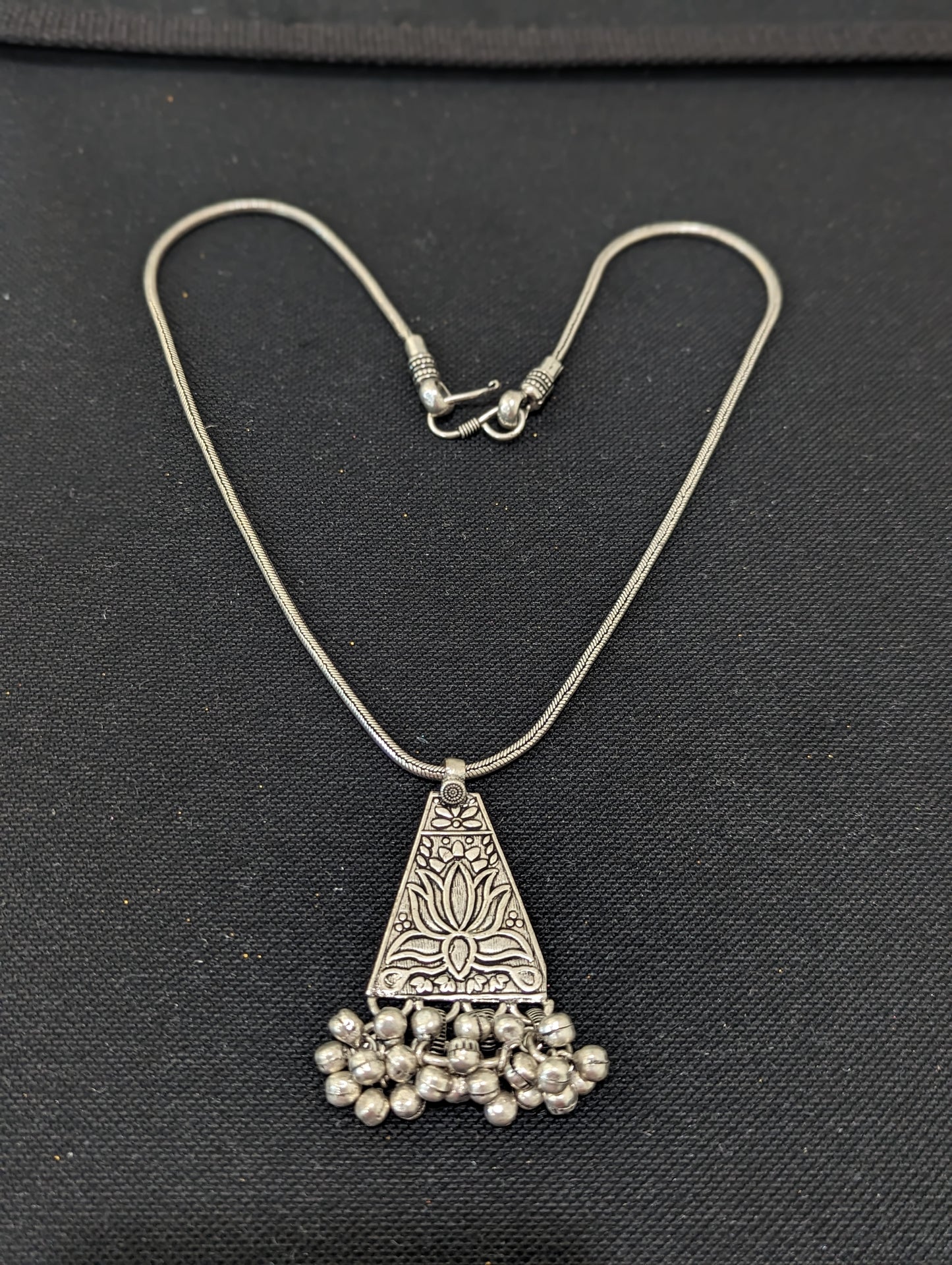 Oxidized ghunghru bead dangle Lotus pendant necklace - Simpliful
