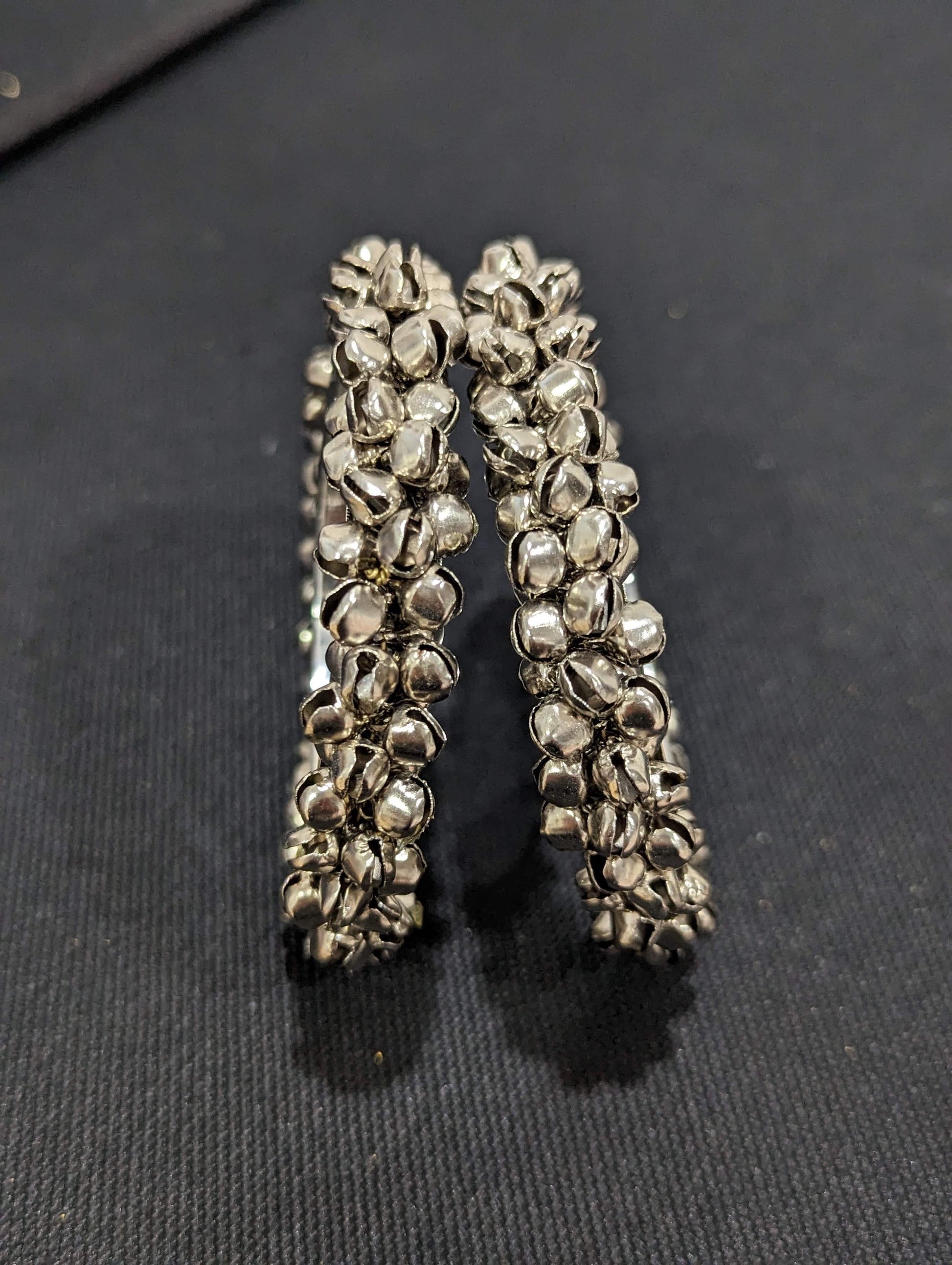 Bold silver ghunghru bead surrounded bangles - Simpliful