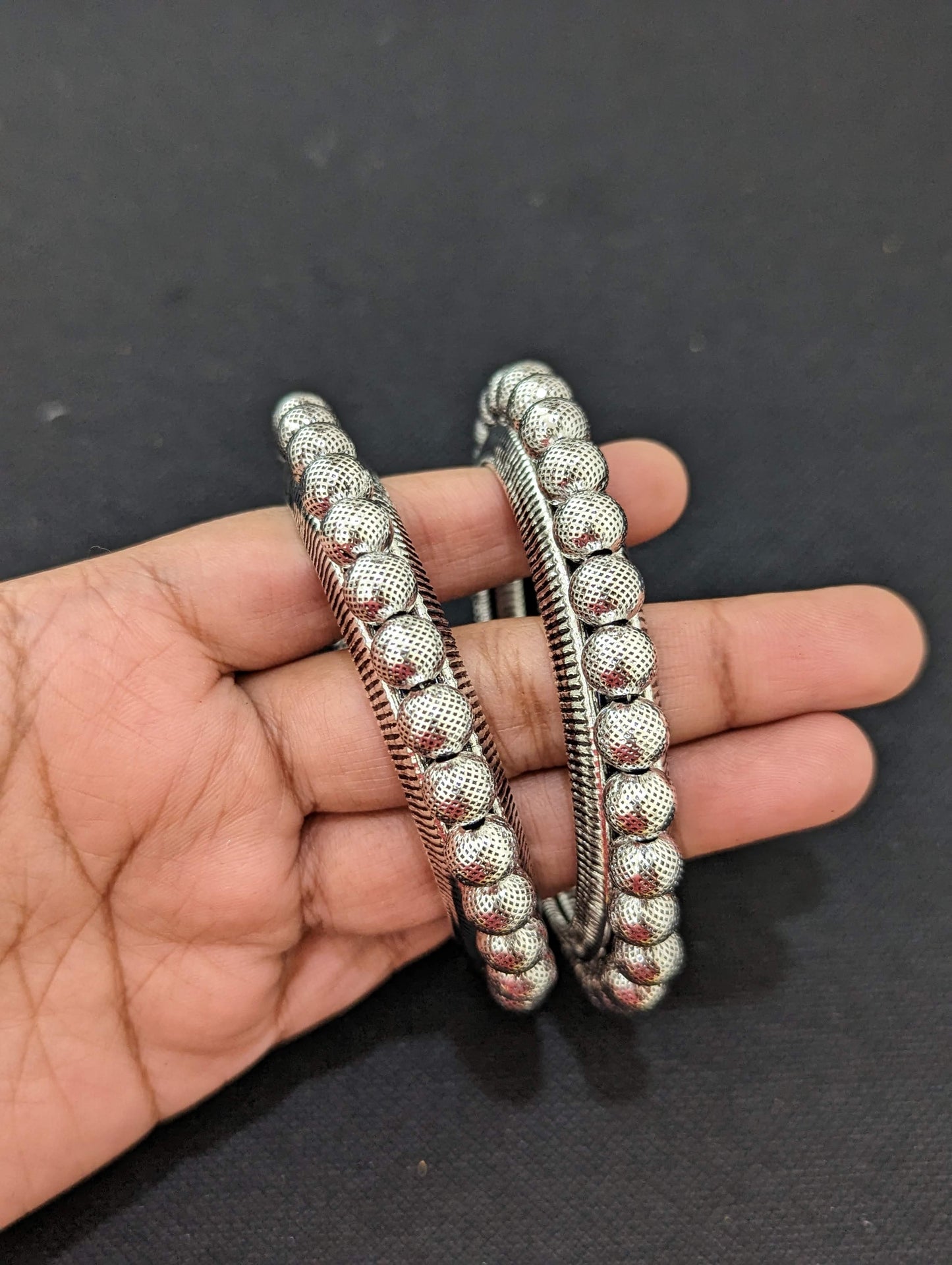 Bright silver Ball design pair bangles
