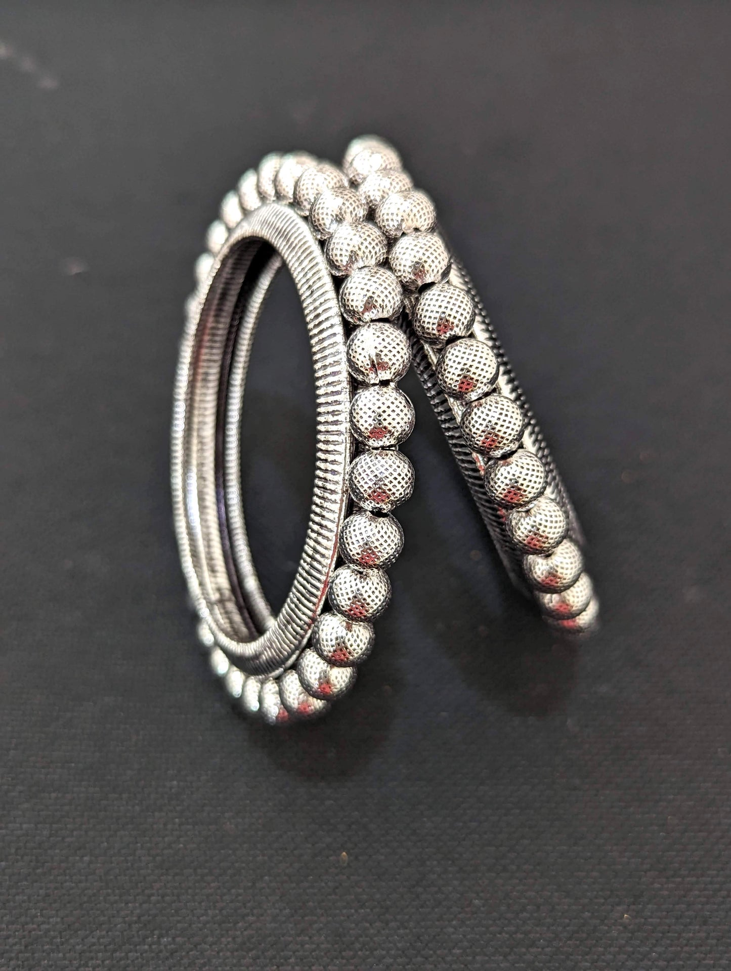 Bright silver Ball design pair bangles