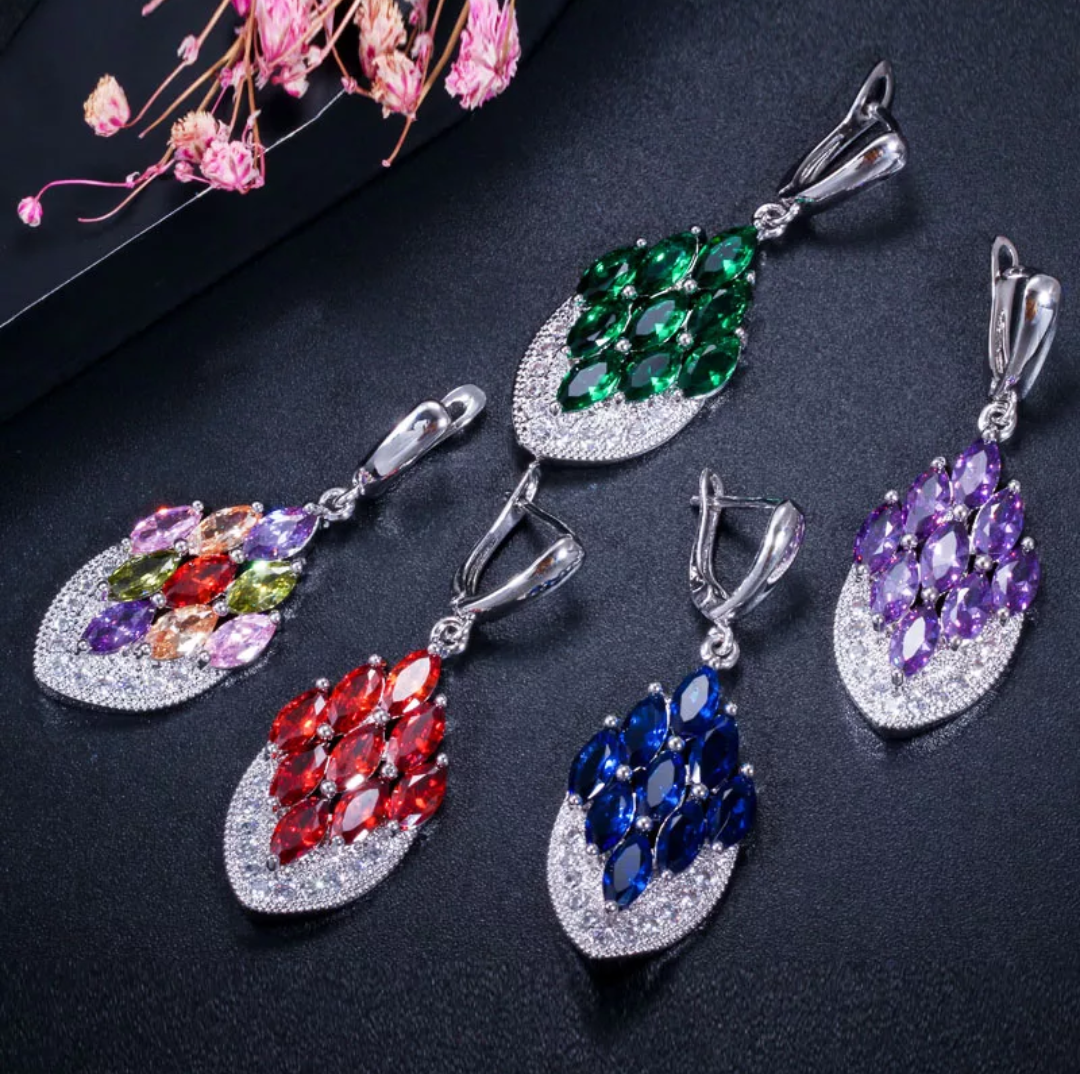 Shiny CZ stone embedded platinum finish curved diamond design earrings - Simpliful