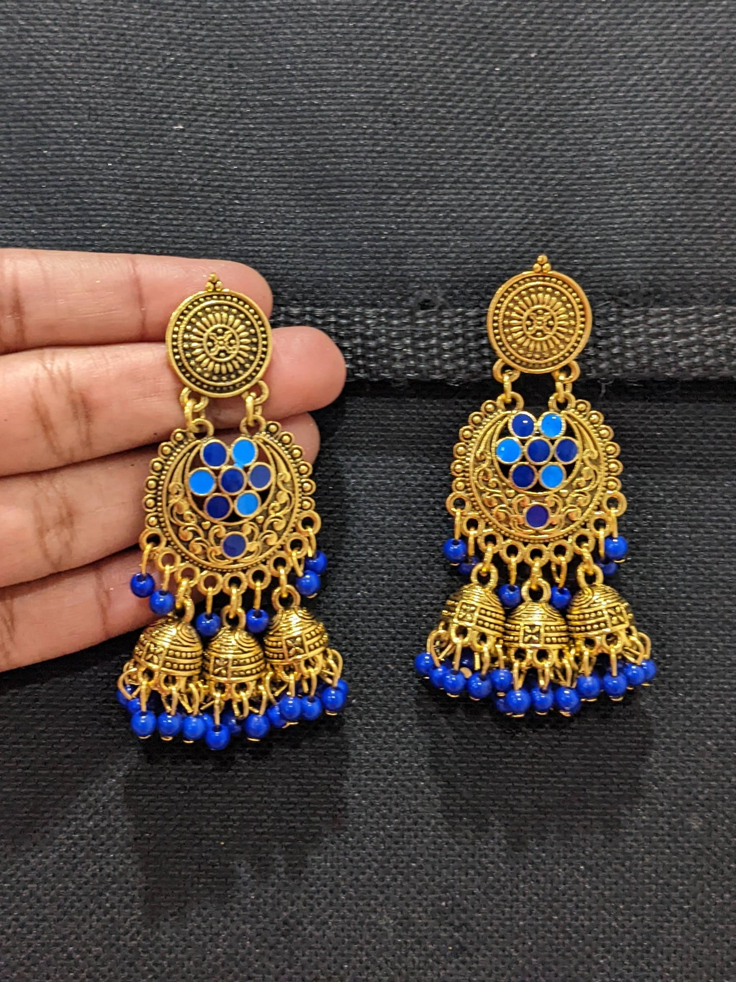 Antique gold finish enamel work triple jhumka earring - Simpliful