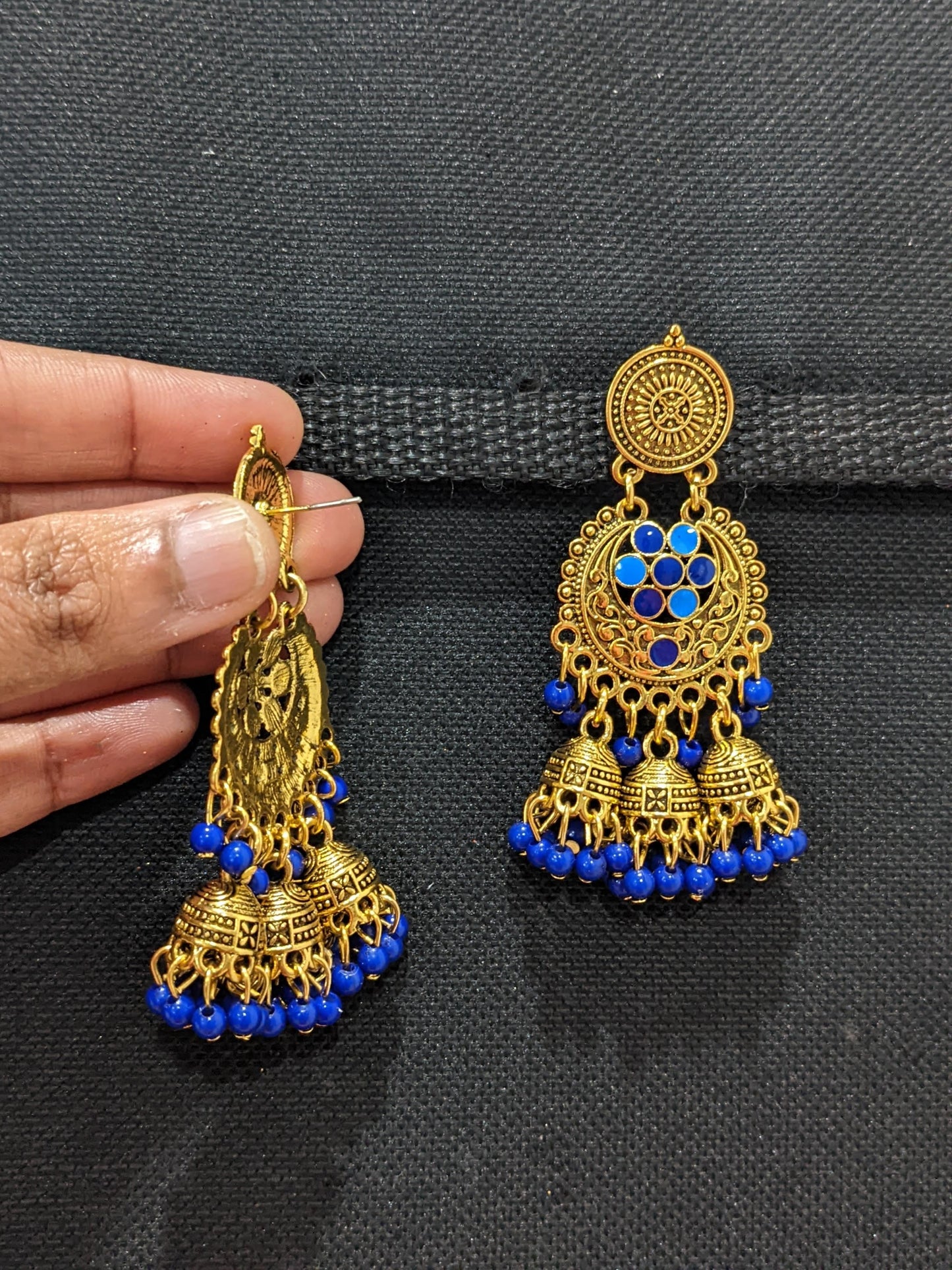 Antique gold finish enamel work triple jhumka earring - Simpliful