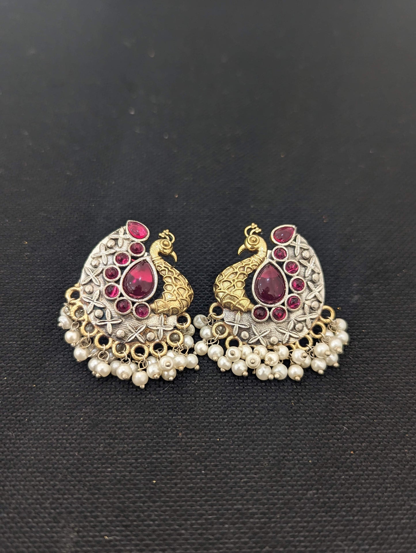 Peacock Dual tone german silver stud earrings