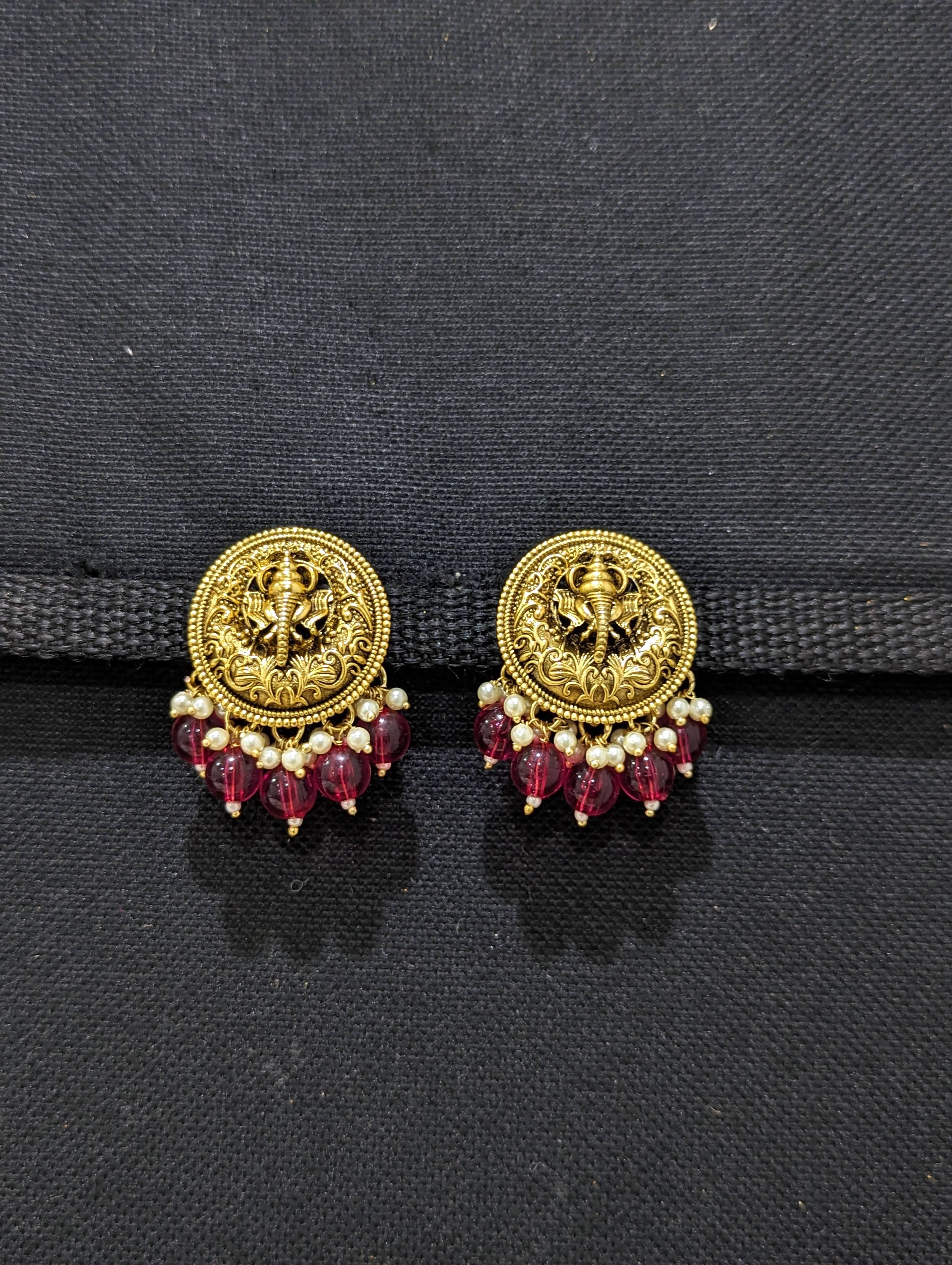 Antique studs in on sale gold