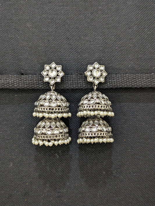 Black plated dual layer jhumka earrings