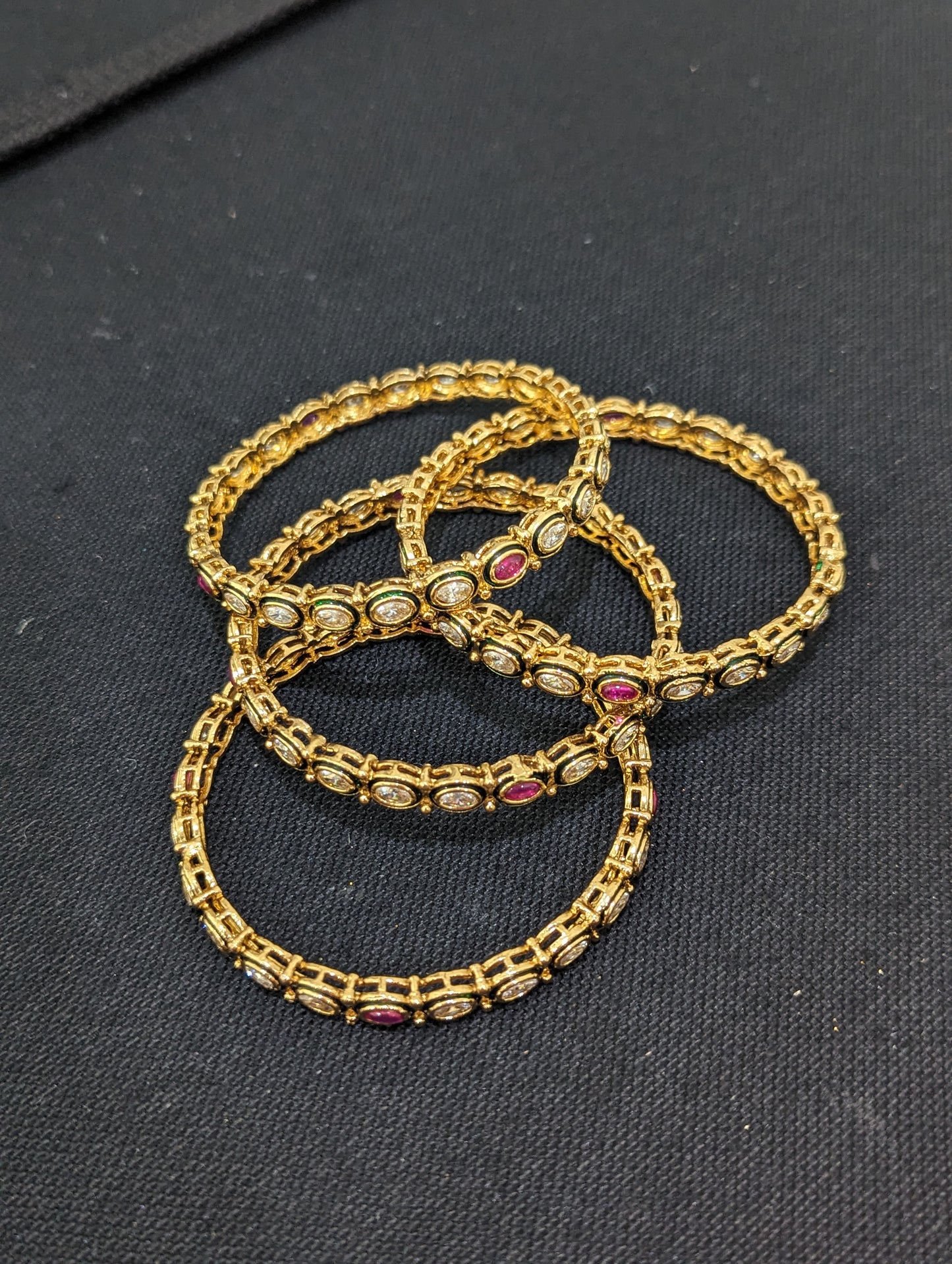 Gold plated Oval Polki stone Bangles - Set of 4