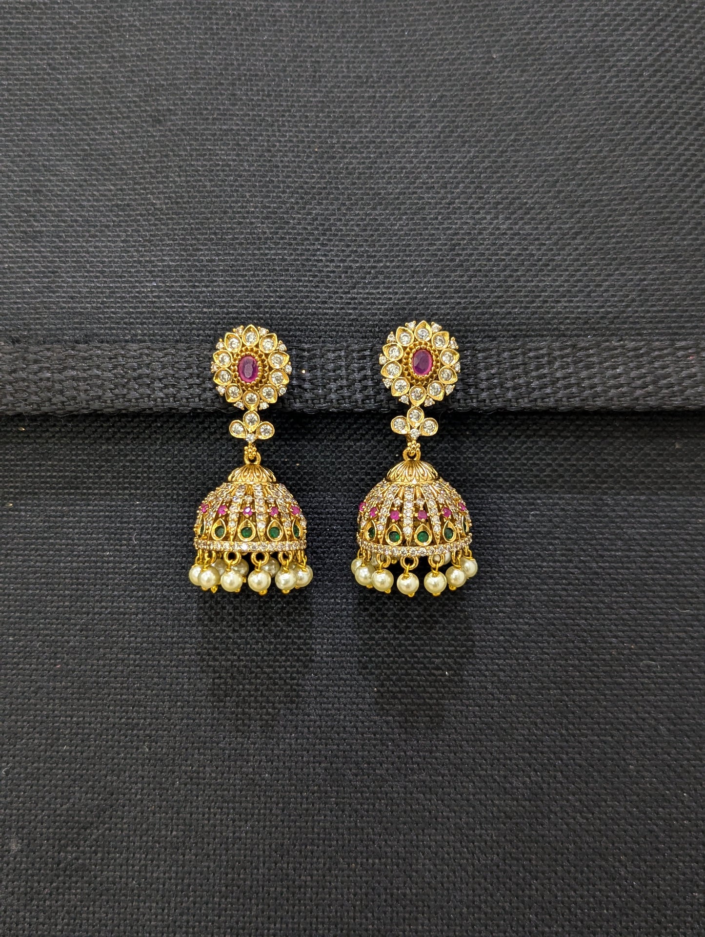 Antique Gold plated Oval stud Jhumka Earrings