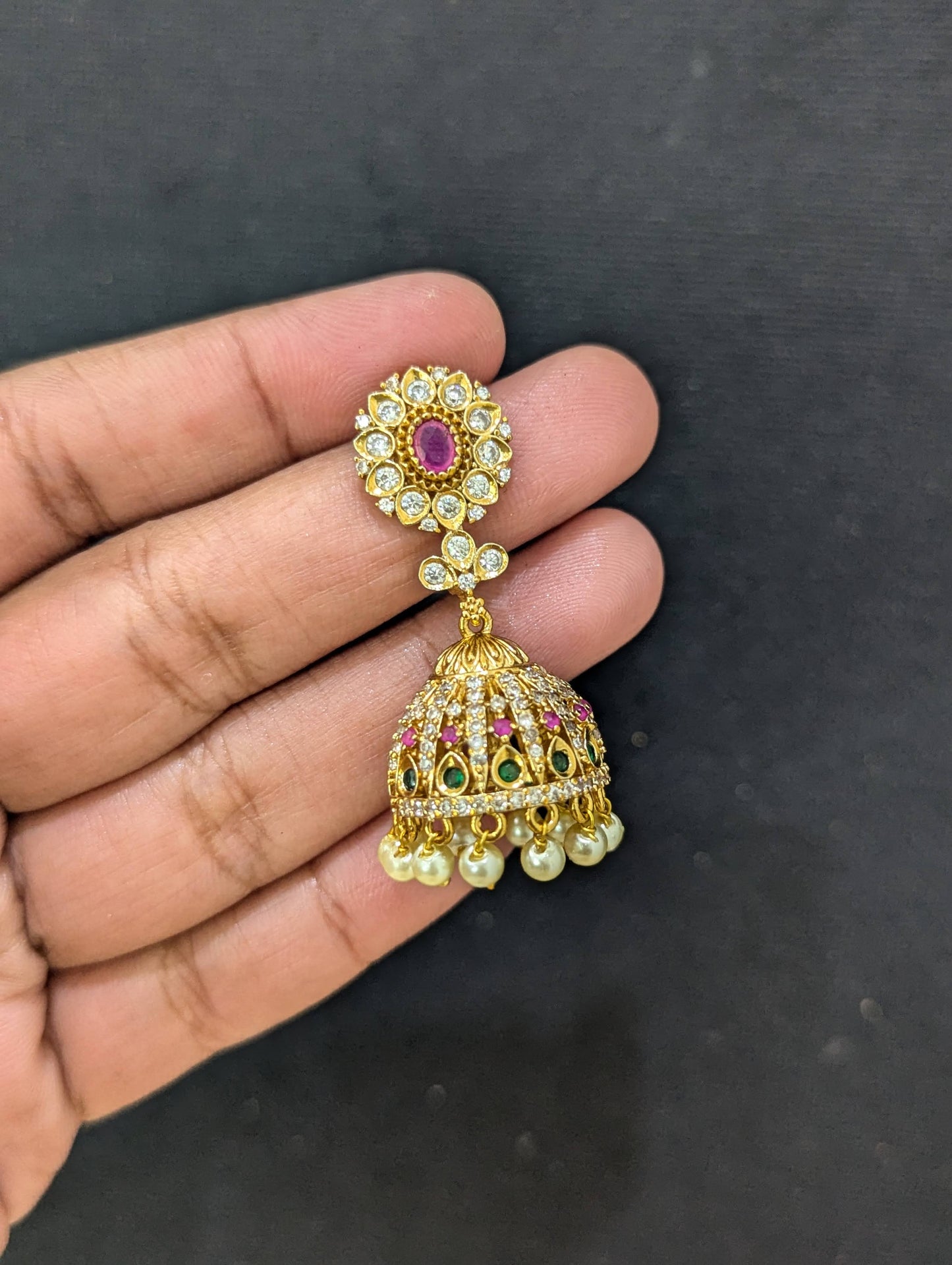 Antique Gold plated Oval stud Jhumka Earrings