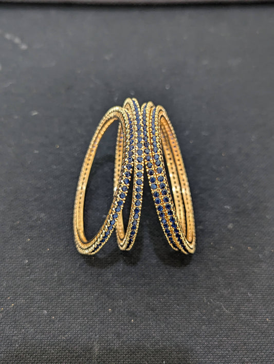 Blue CZ one gram gold polished bangles - Set of 4 (Copy)