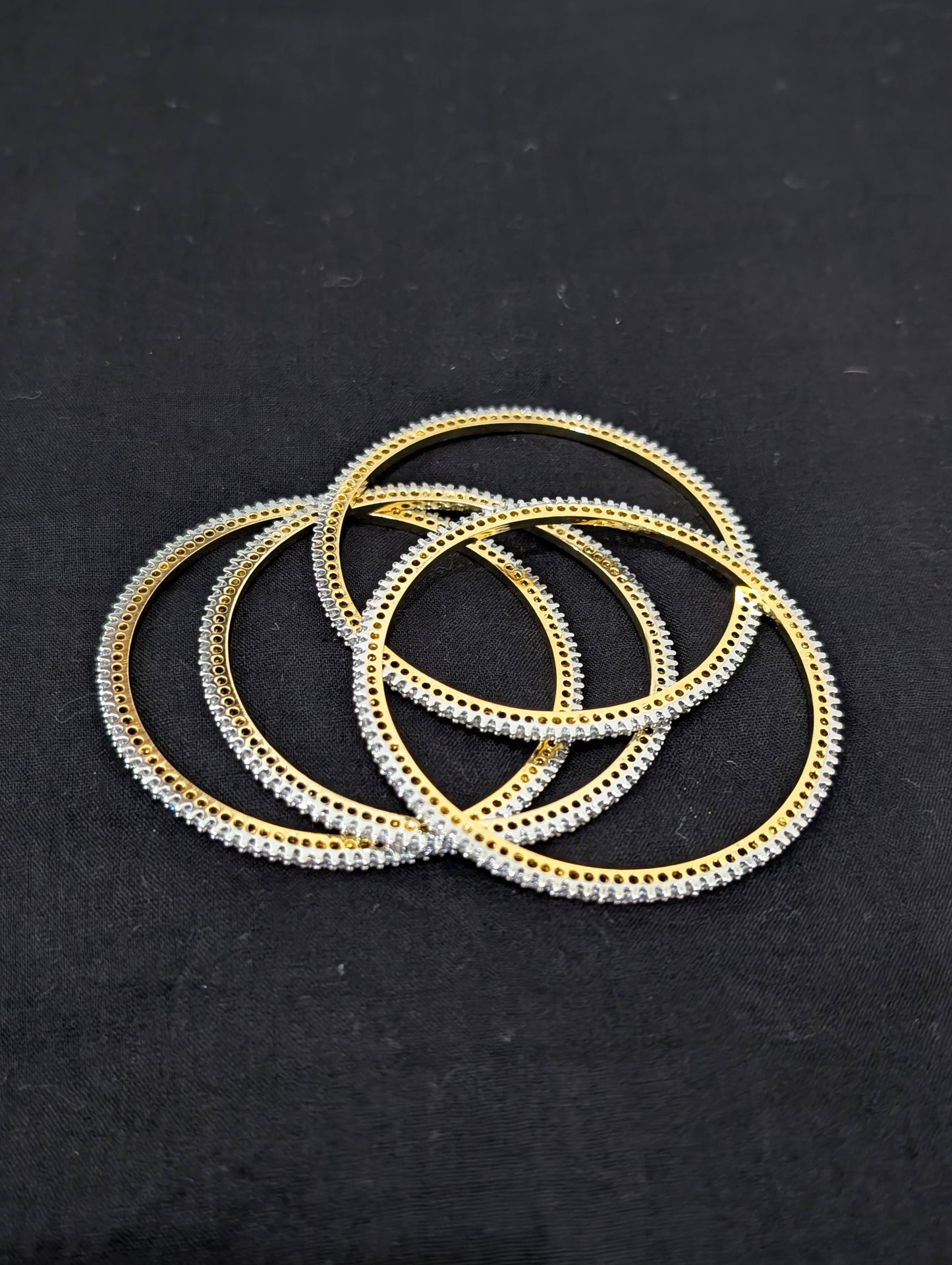 White CZ one gram gold polished bangles - Set of 4