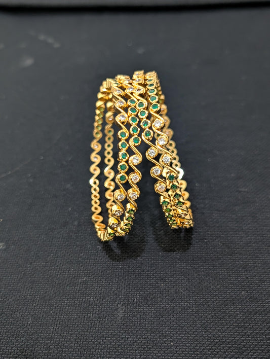 Green White CZ one gram gold polished bangles - Set of 4