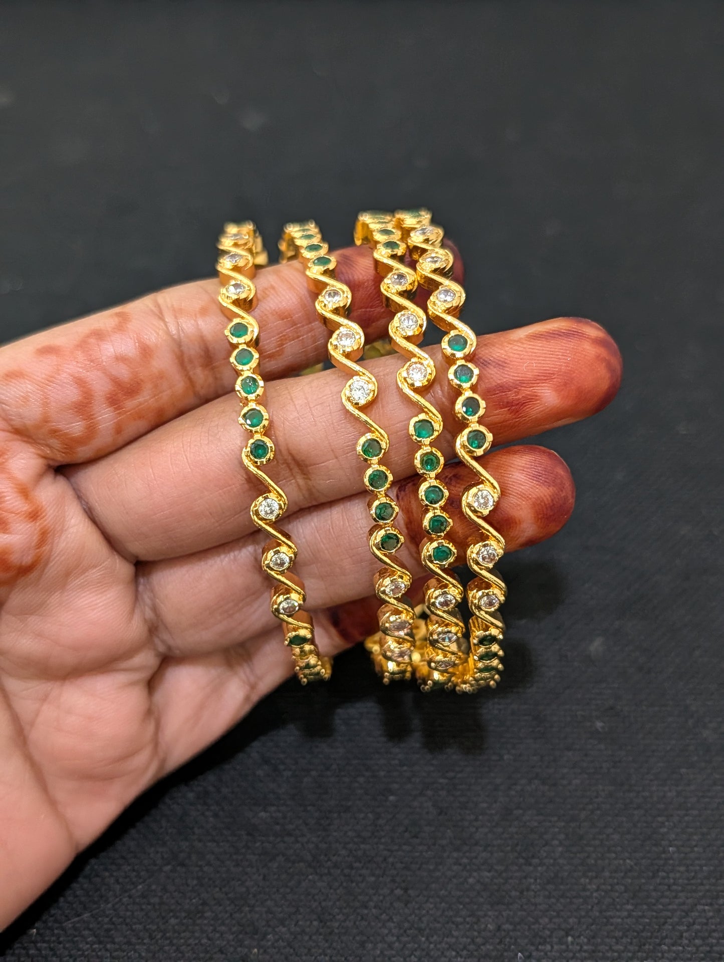 Green White CZ one gram gold polished bangles - Set of 4