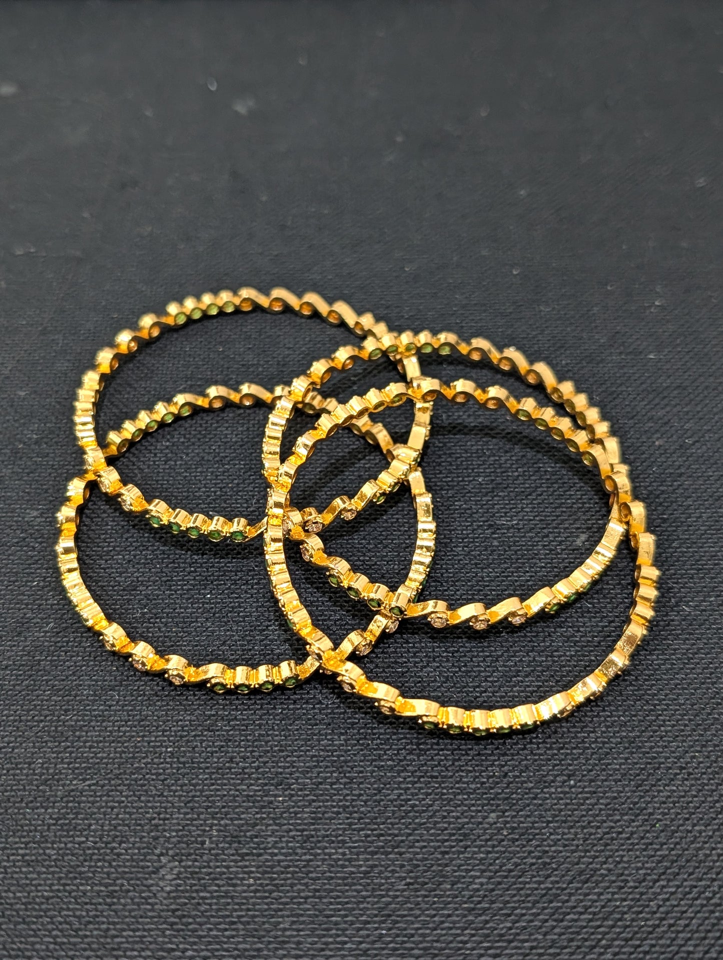 Green White CZ one gram gold polished bangles - Set of 4