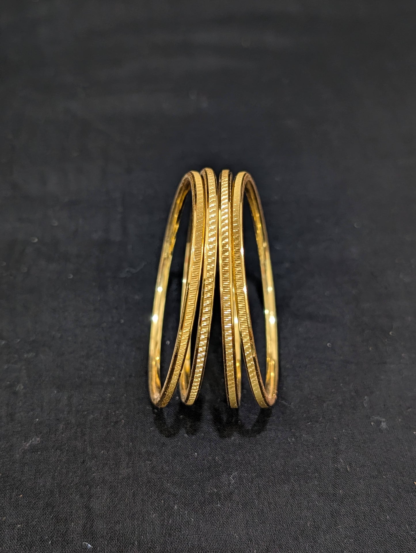 Bright gold plated Thin Bangles - Set of 4