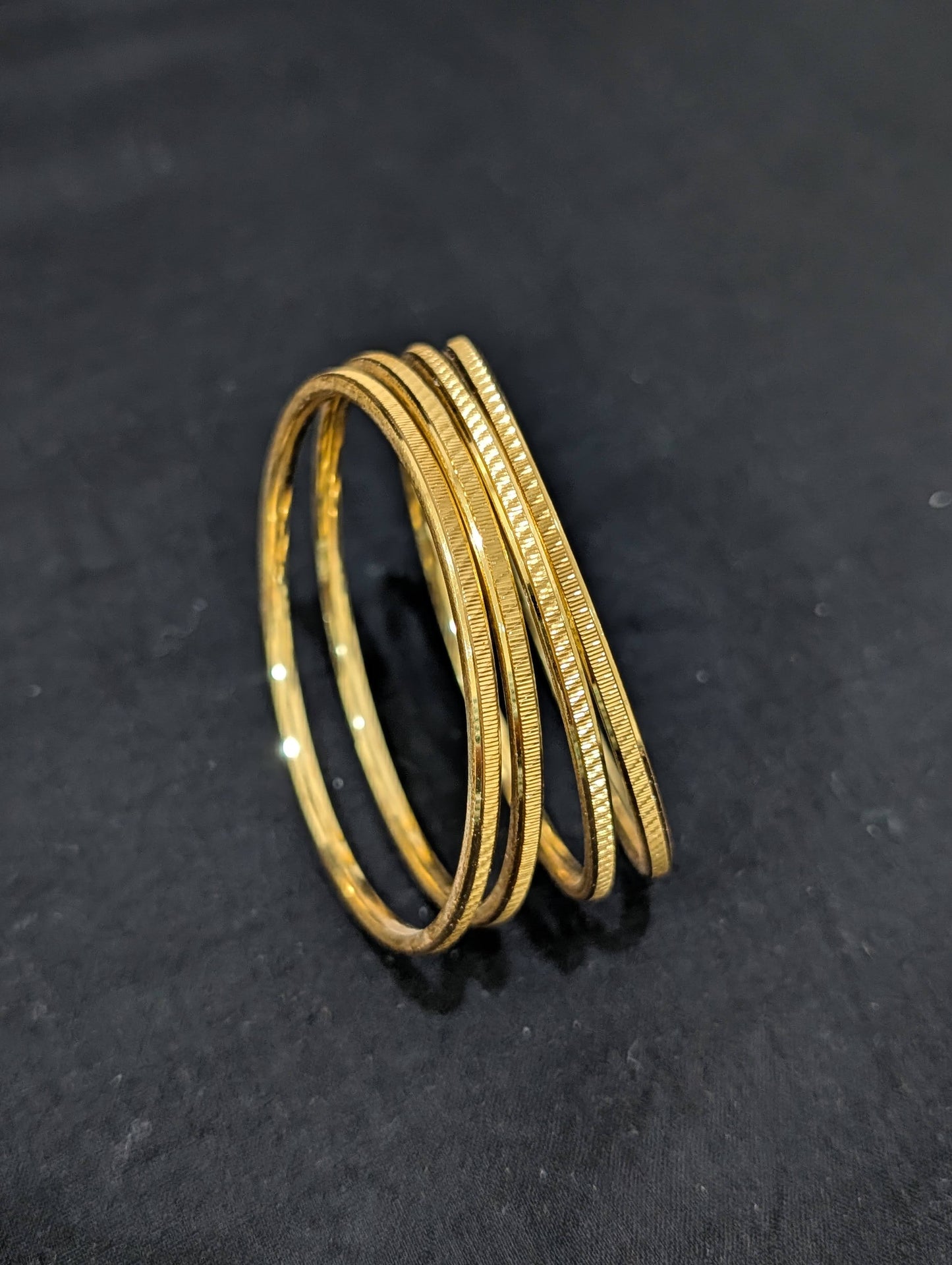 Bright gold plated Thin Bangles - Set of 4