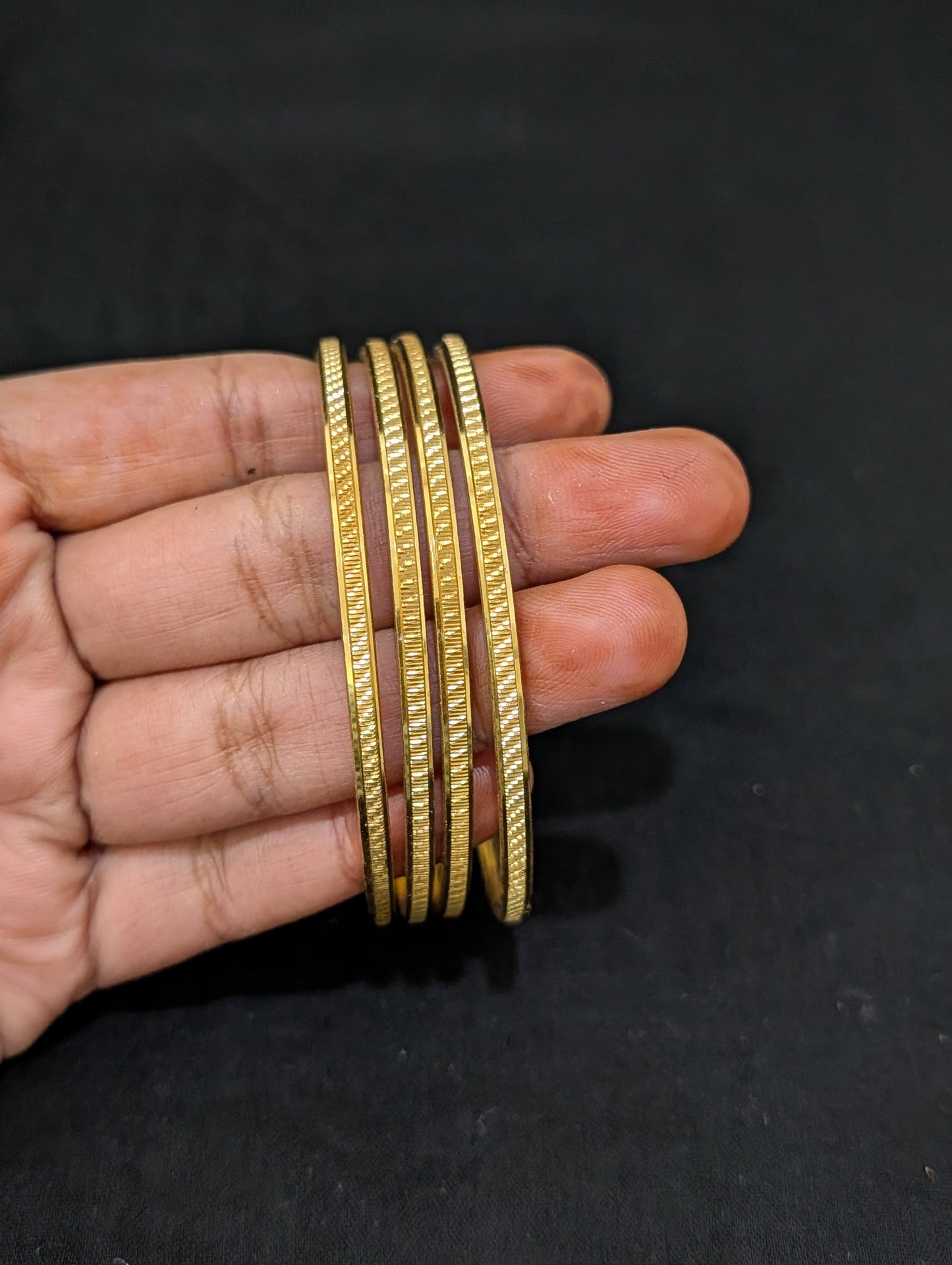 Bright gold plated Thin Bangles - Set of 4