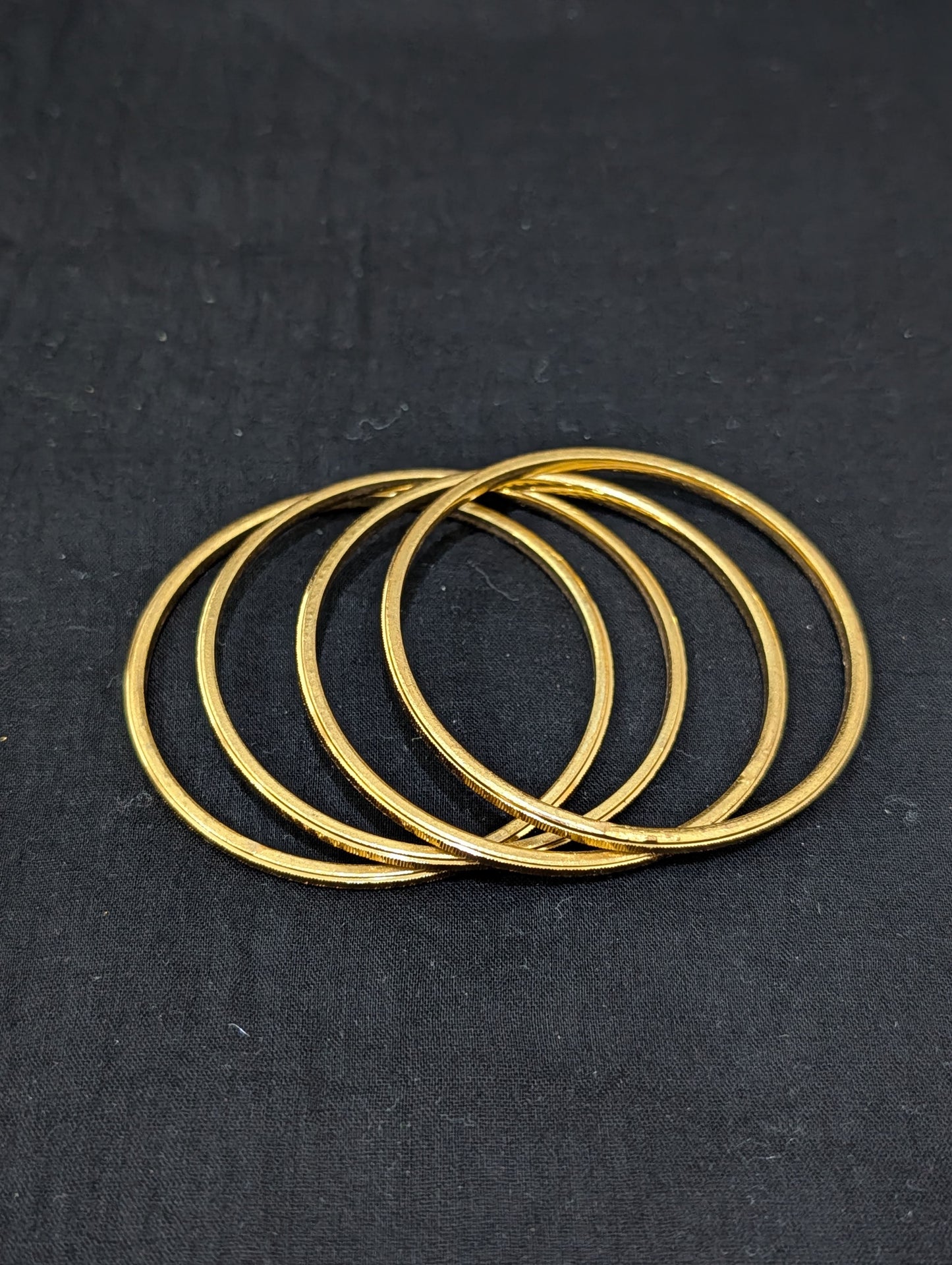 Bright gold plated Thin Bangles - Set of 4