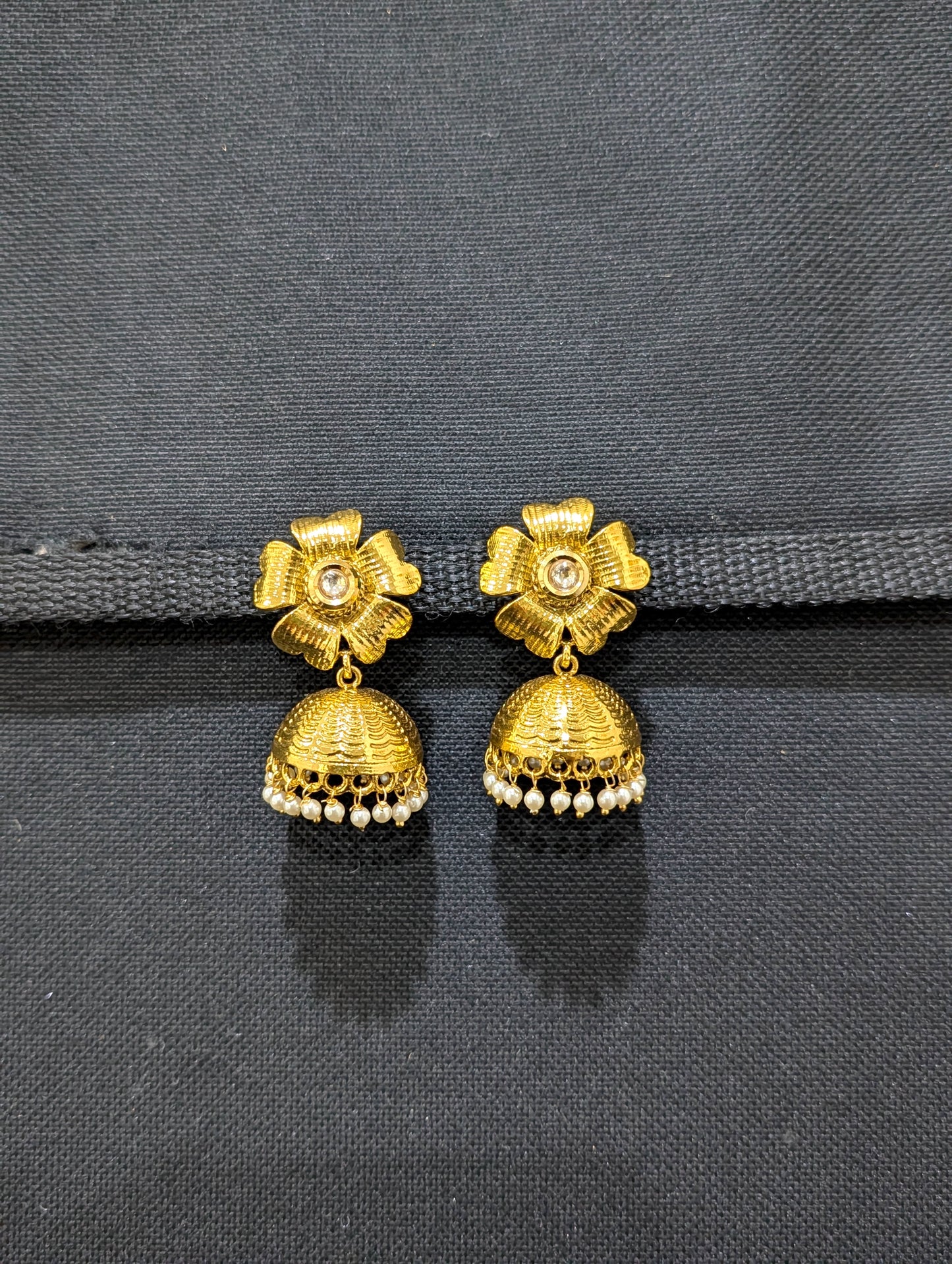Shiny Gold plated Kundan Jhumka Earrings