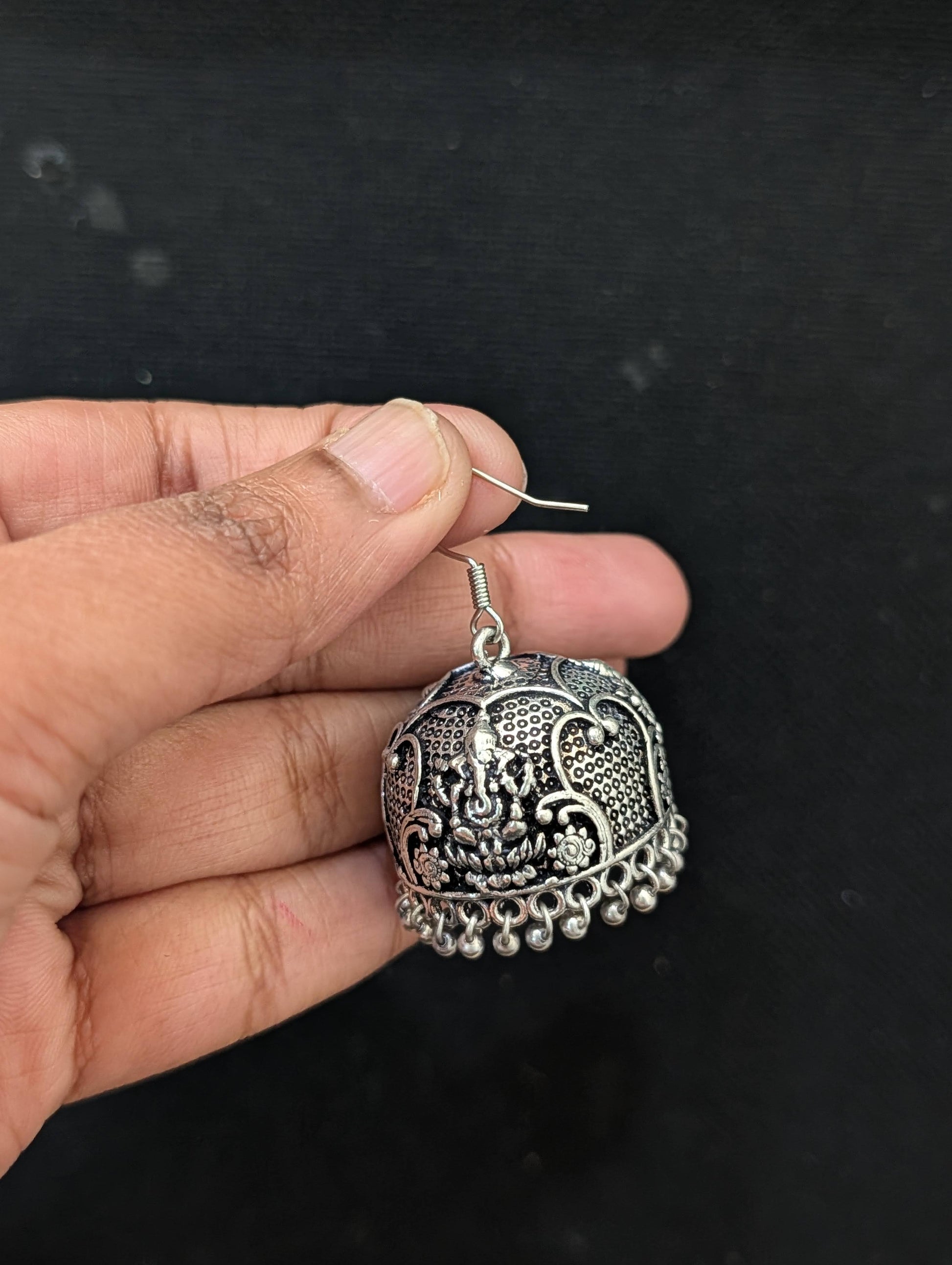 Oxidized silver Lord Ganseha hook drop jhumka earrings - Simpliful