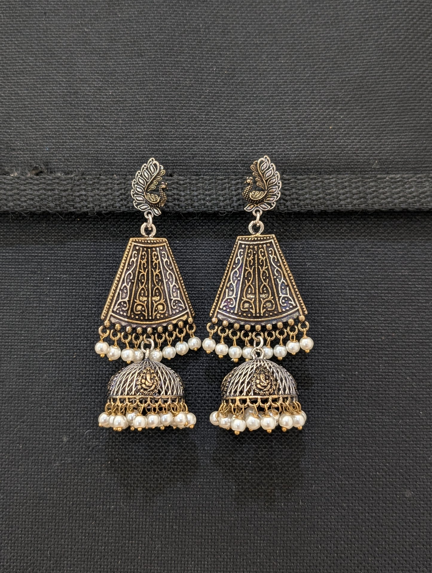 Lord Ganesh Dual tone Oxidized Silver Jhumka Earrings - Simpliful