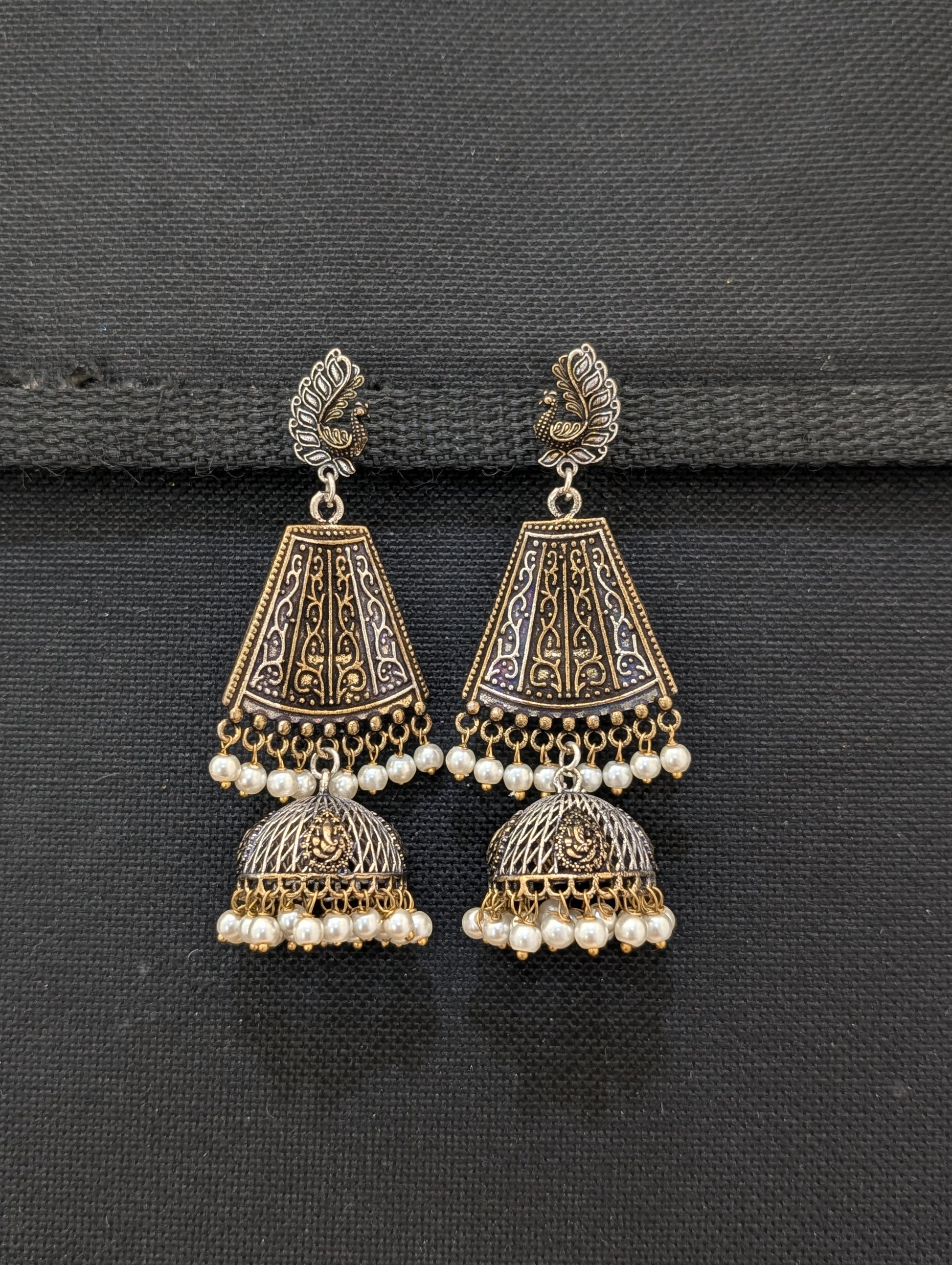 Lord Ganesh Dual tone Oxidized Silver Jhumka Earrings - Simpliful