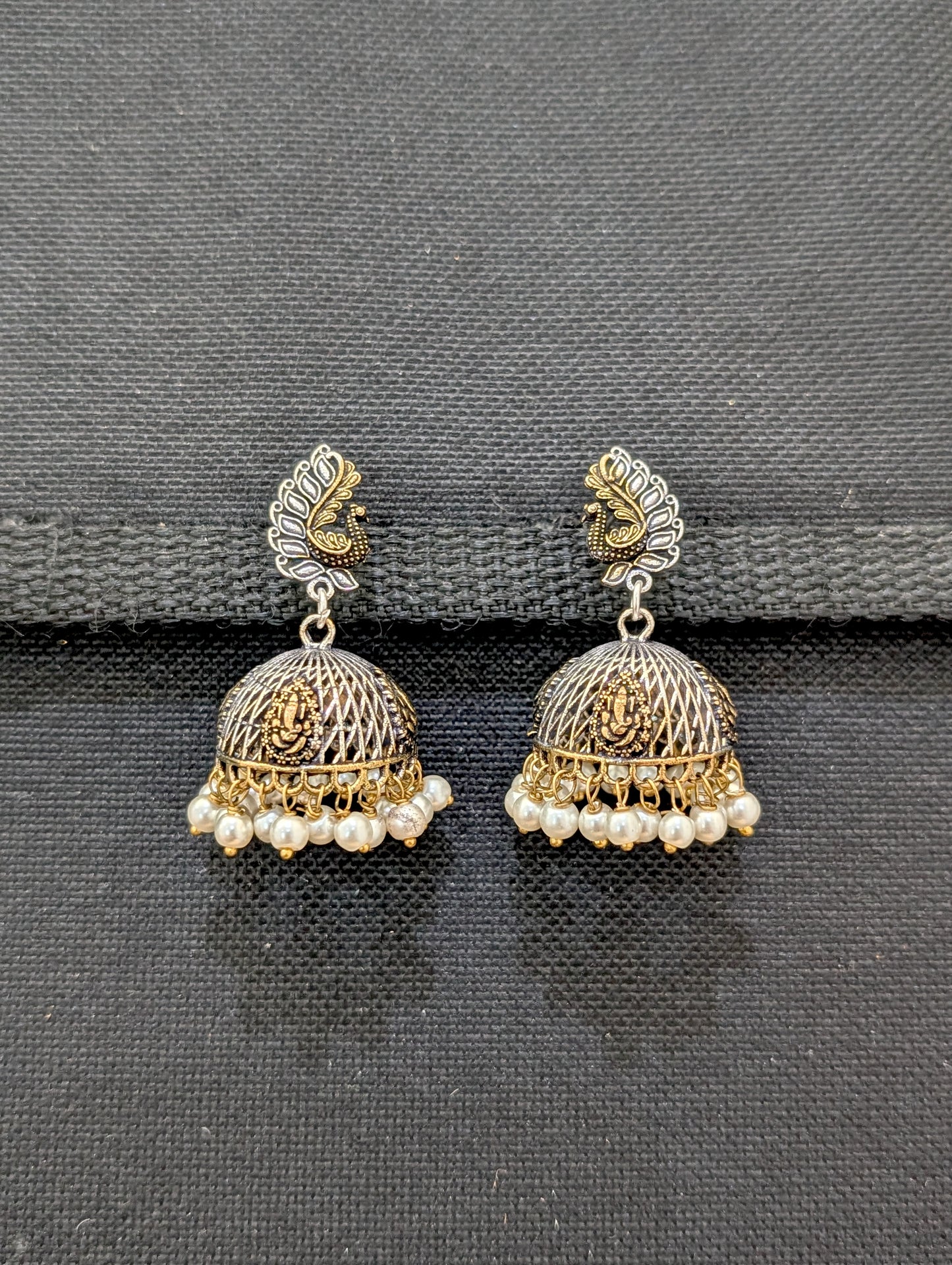 Peacock Ganesh ji dual tone oxidized silver jhumka earrings - Simpliful