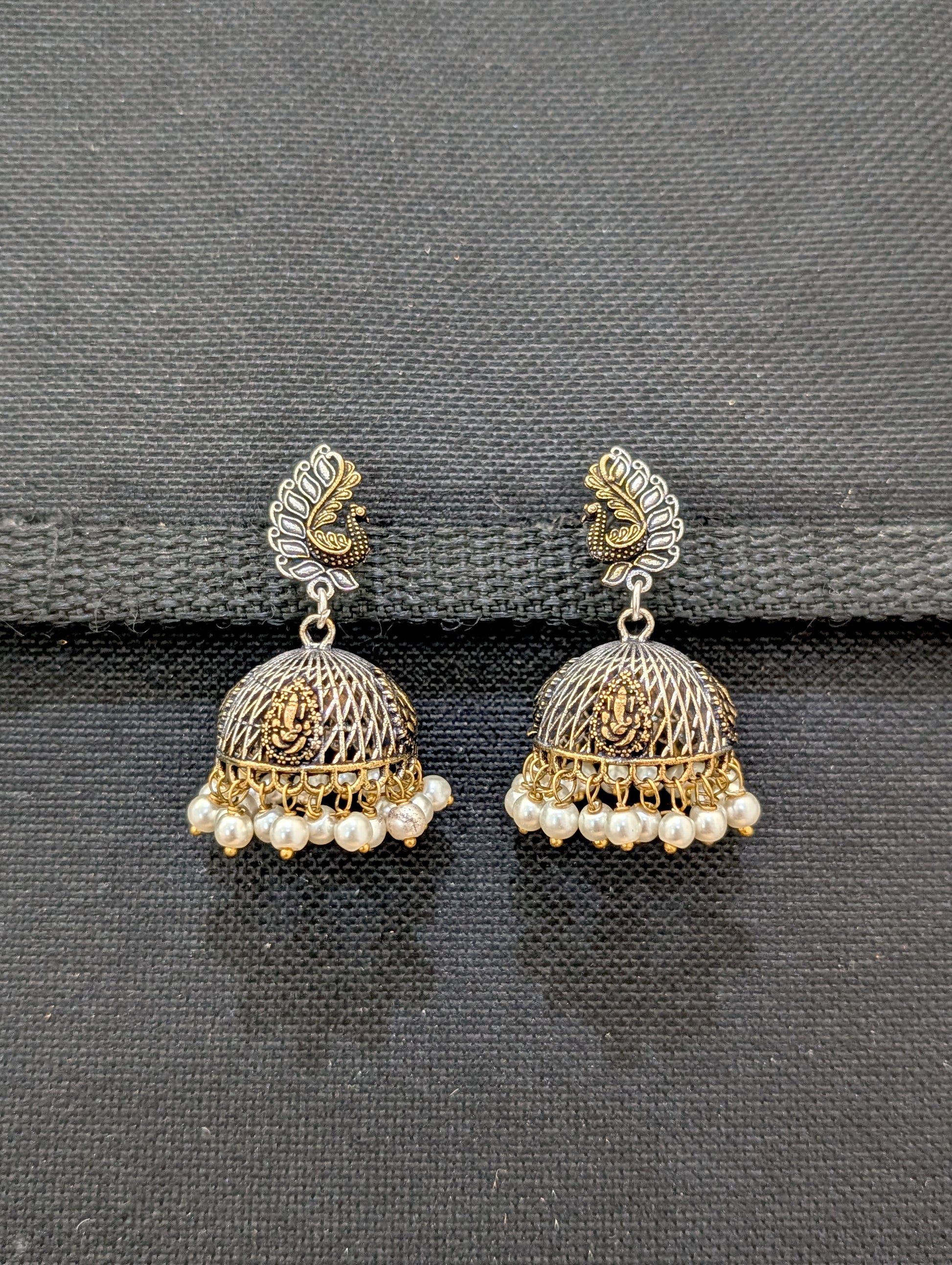 Peacock Ganesh ji dual tone oxidized silver jhumka earrings - Simpliful