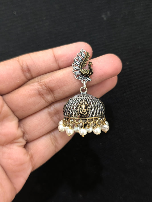 Peacock Ganesh ji dual tone oxidized silver jhumka earrings - Simpliful