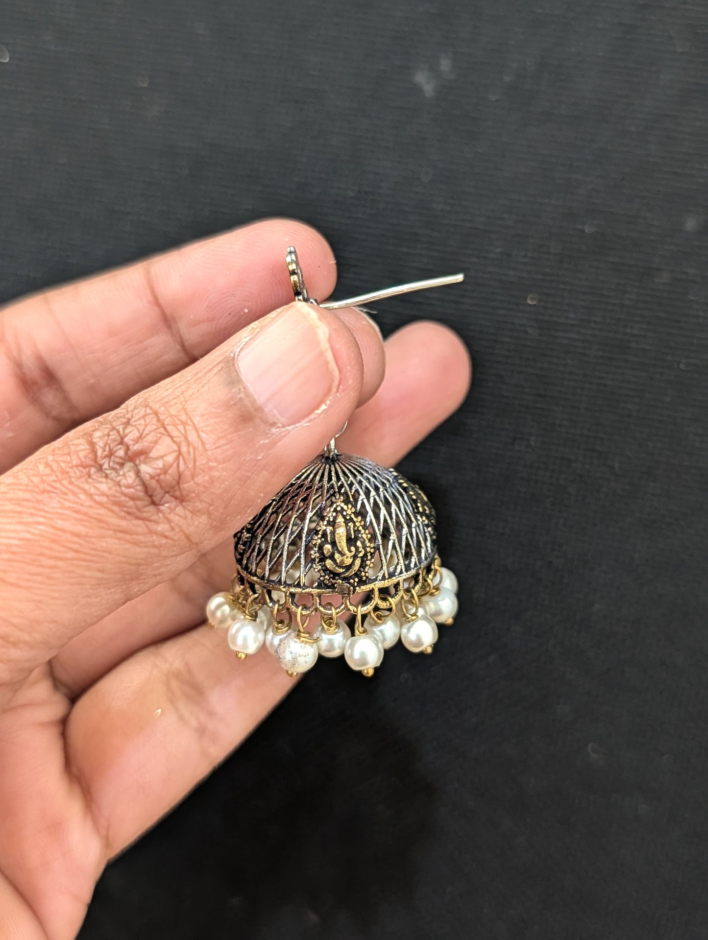 Peacock Ganesh ji dual tone oxidized silver jhumka earrings - Simpliful