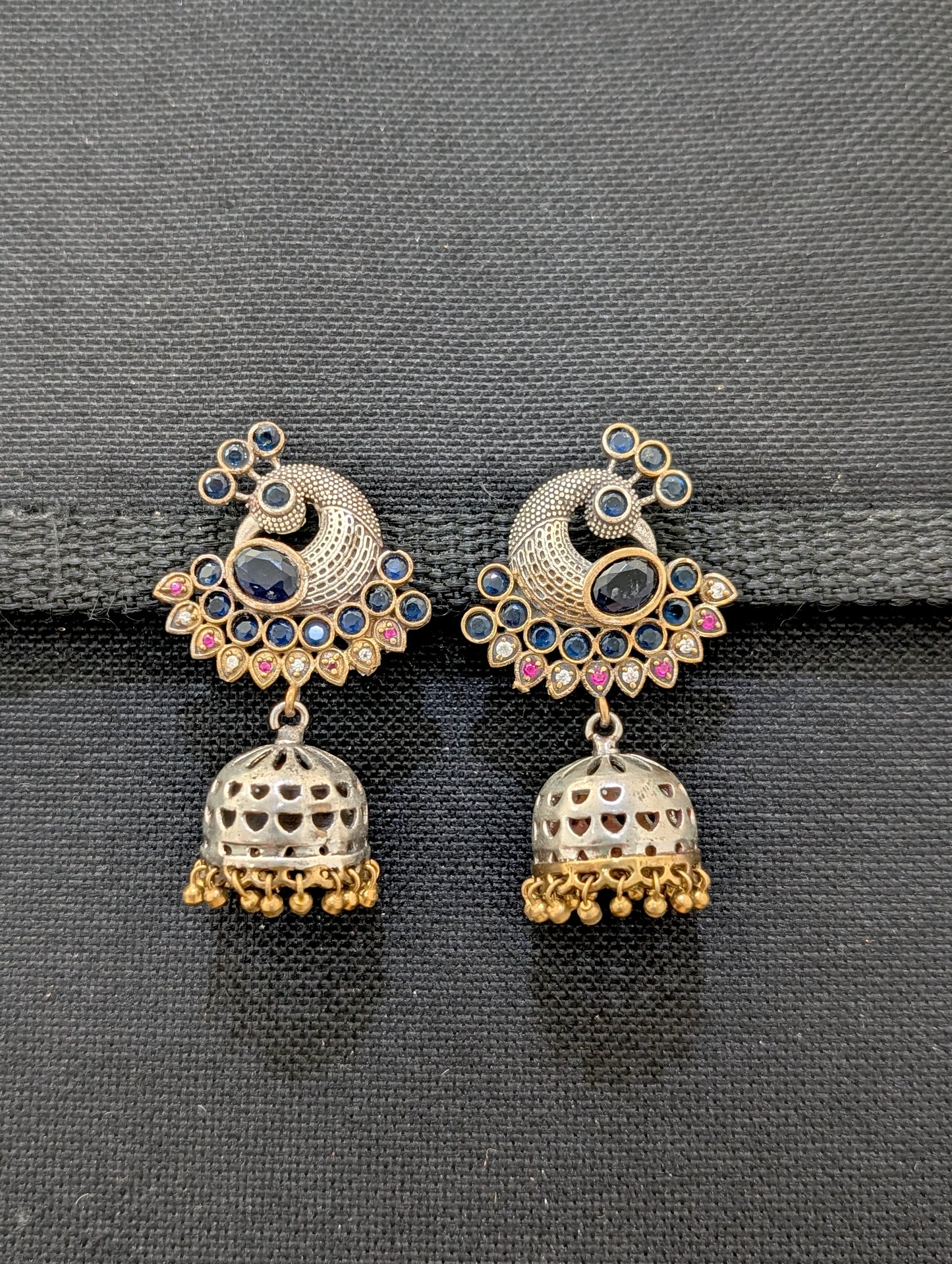 Peacock dual tone oxidized silver Blue jhumka earrings - Simpliful