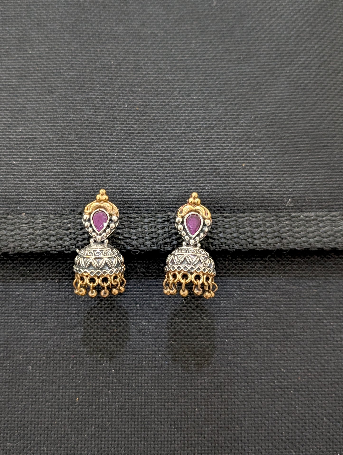 Cut Jhumka dual tone oxidized silver Stud earrings - Simpliful