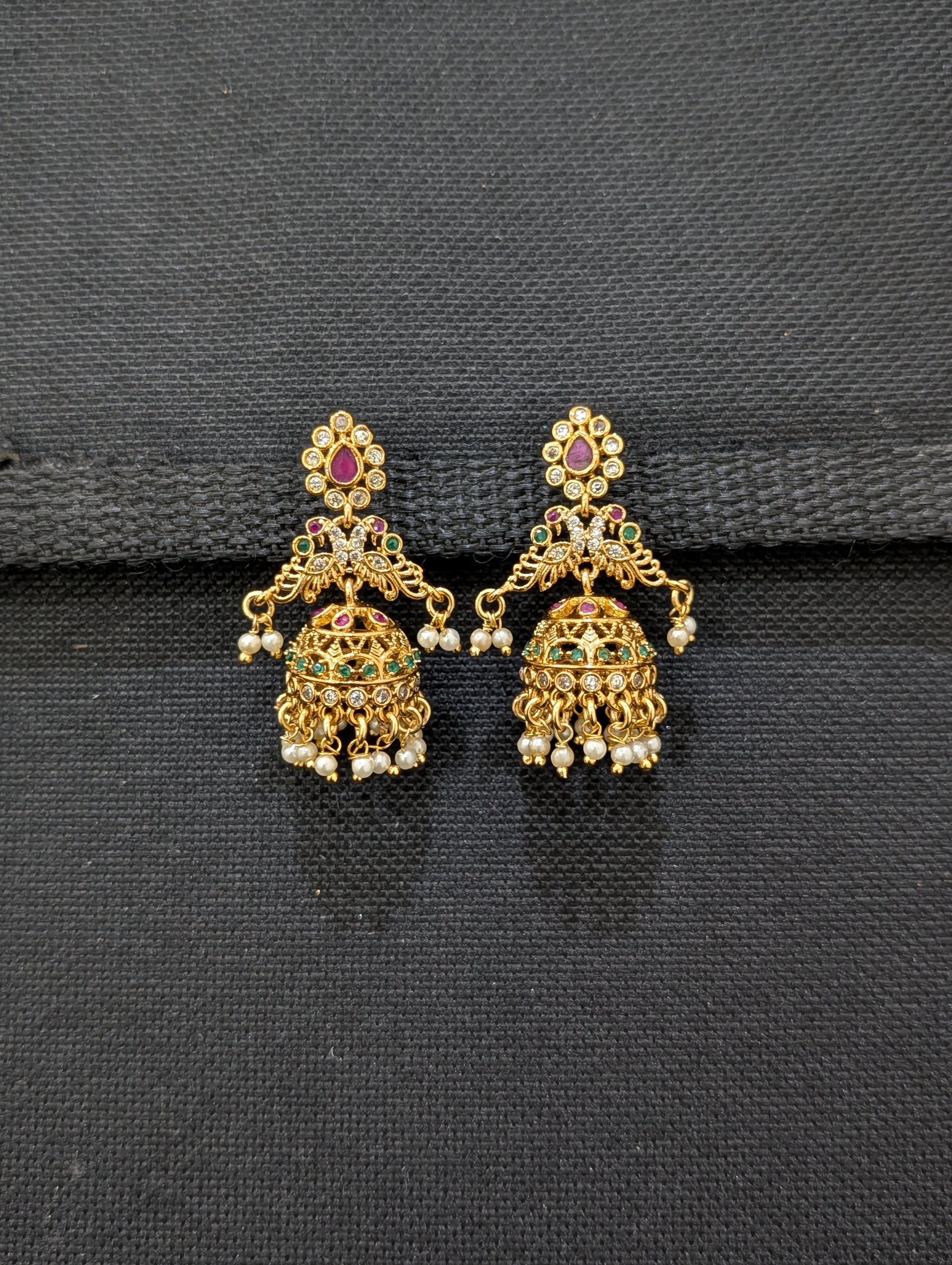 Shiny gold plated CZ Peacock Jhumka Earrings - Simpliful
