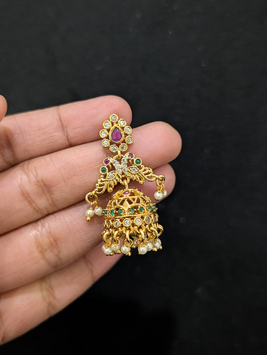 Shiny gold plated CZ Peacock Jhumka Earrings - Simpliful