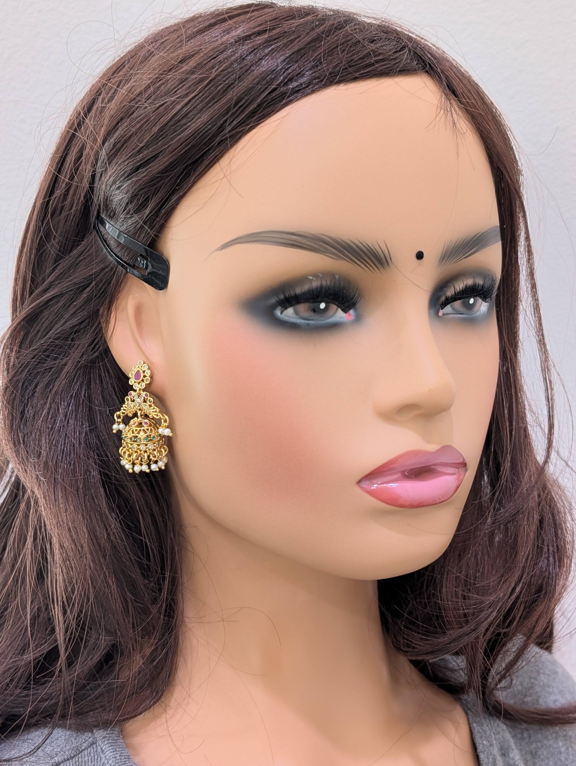 Shiny gold plated CZ Peacock Jhumka Earrings - Simpliful