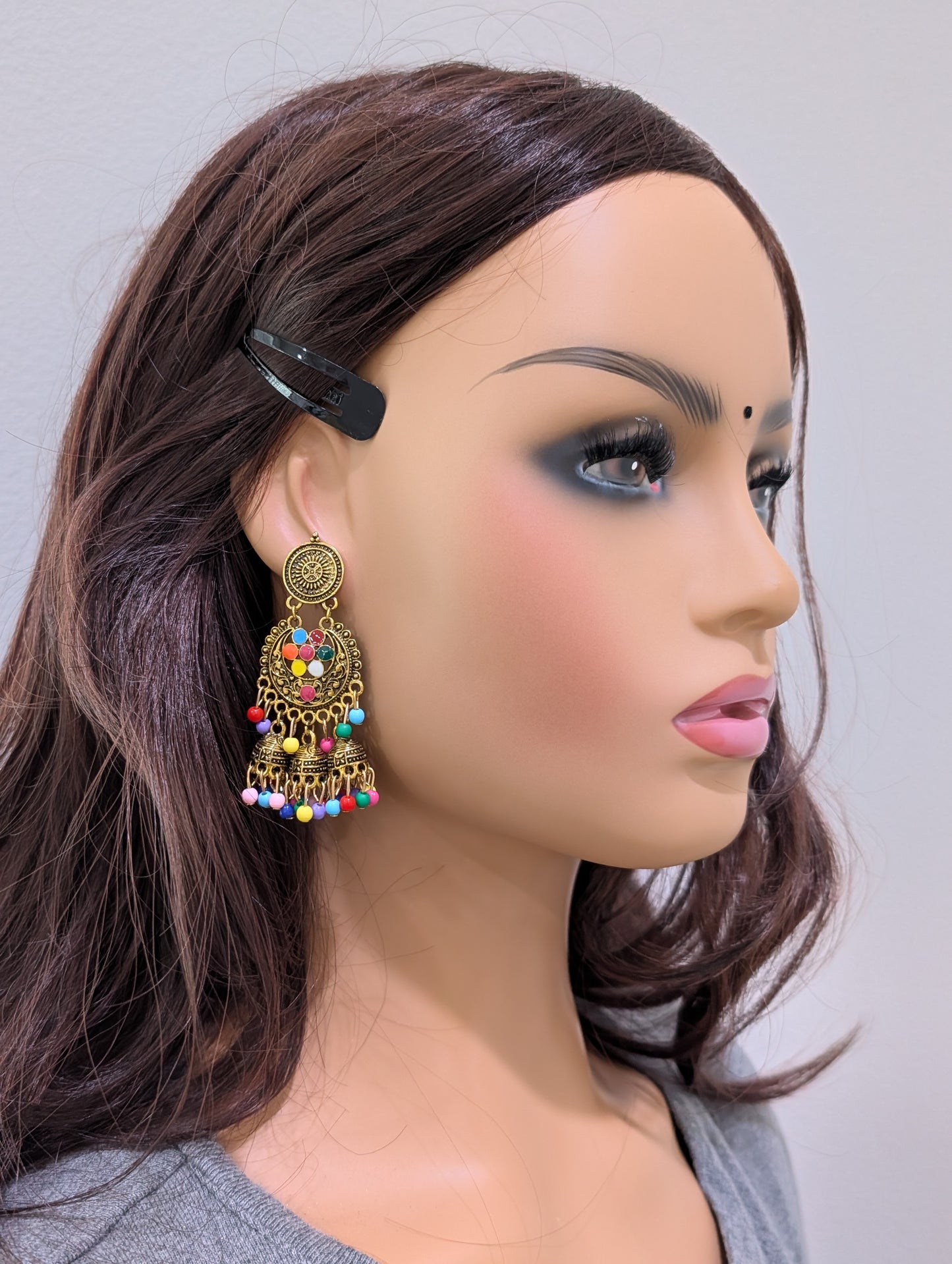 Antique gold finish enamel work triple jhumka earring - Simpliful