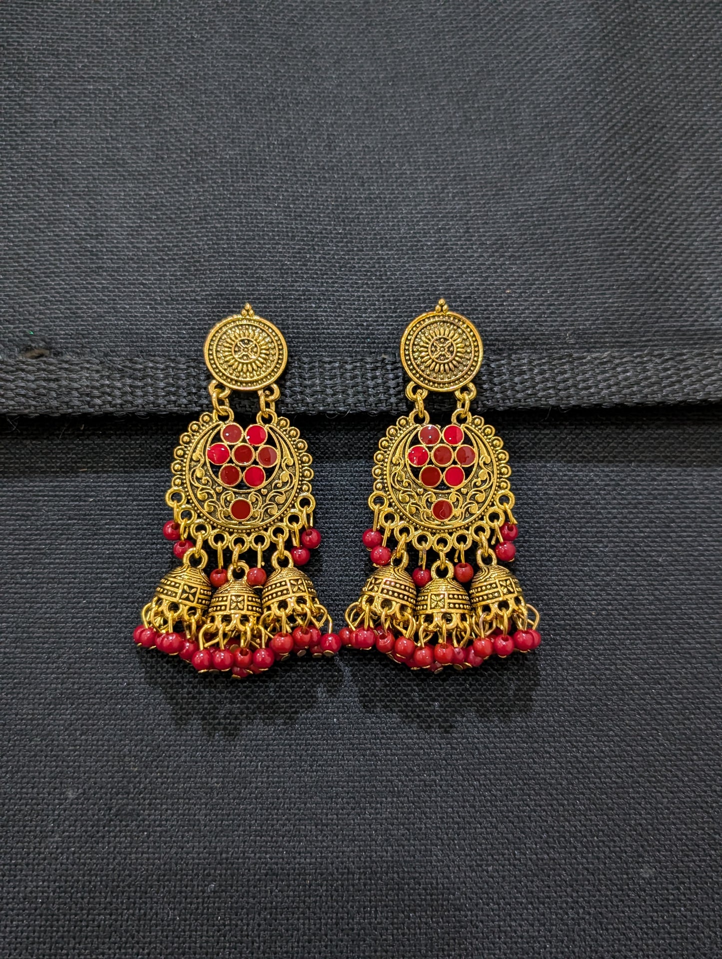 Antique gold finish enamel work triple jhumka earring - Simpliful