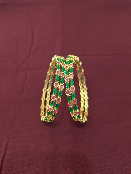 Ruby Green CZ one gram gold polished bangles - Set of 4
