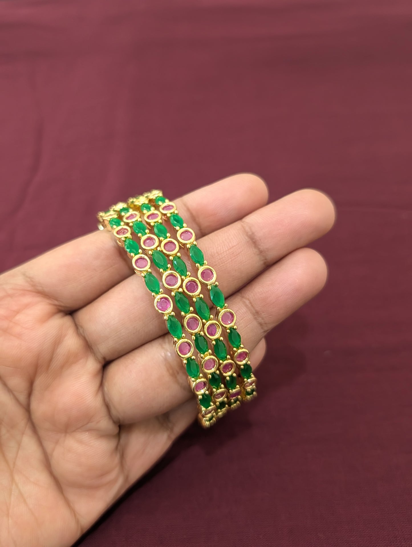 Ruby Green CZ one gram gold polished bangles - Set of 4