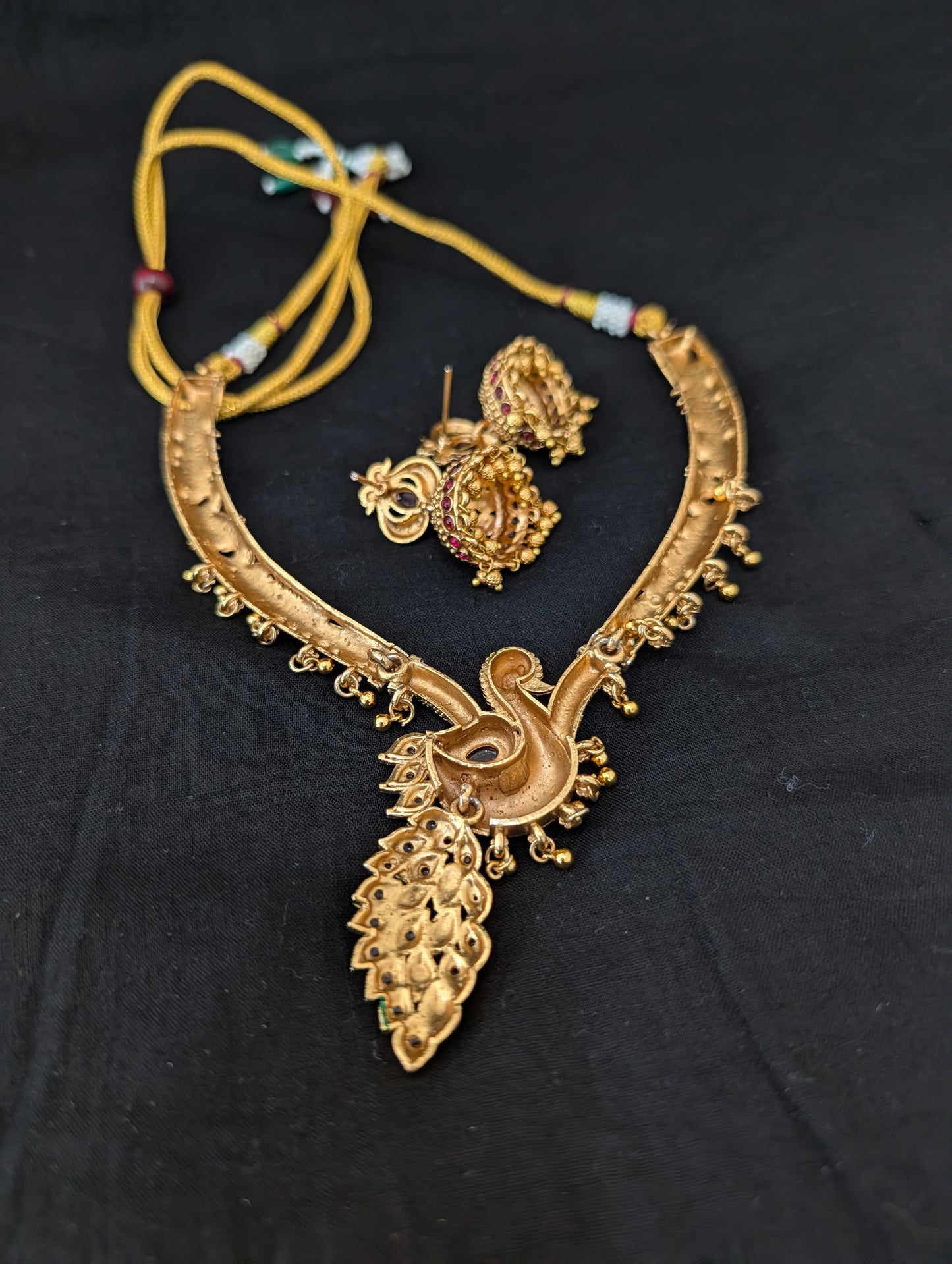 Hasli Peacock design Kemp Choker Jhumka set